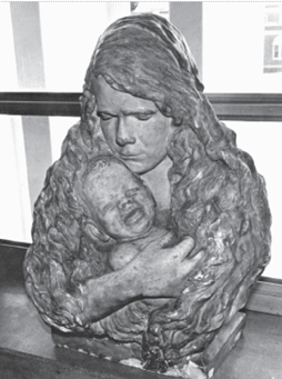 Bust of a mother with long hair holding a crying baby