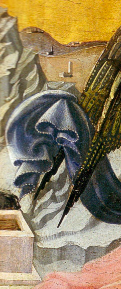 Shaded folds of the angel's blue fabrics.