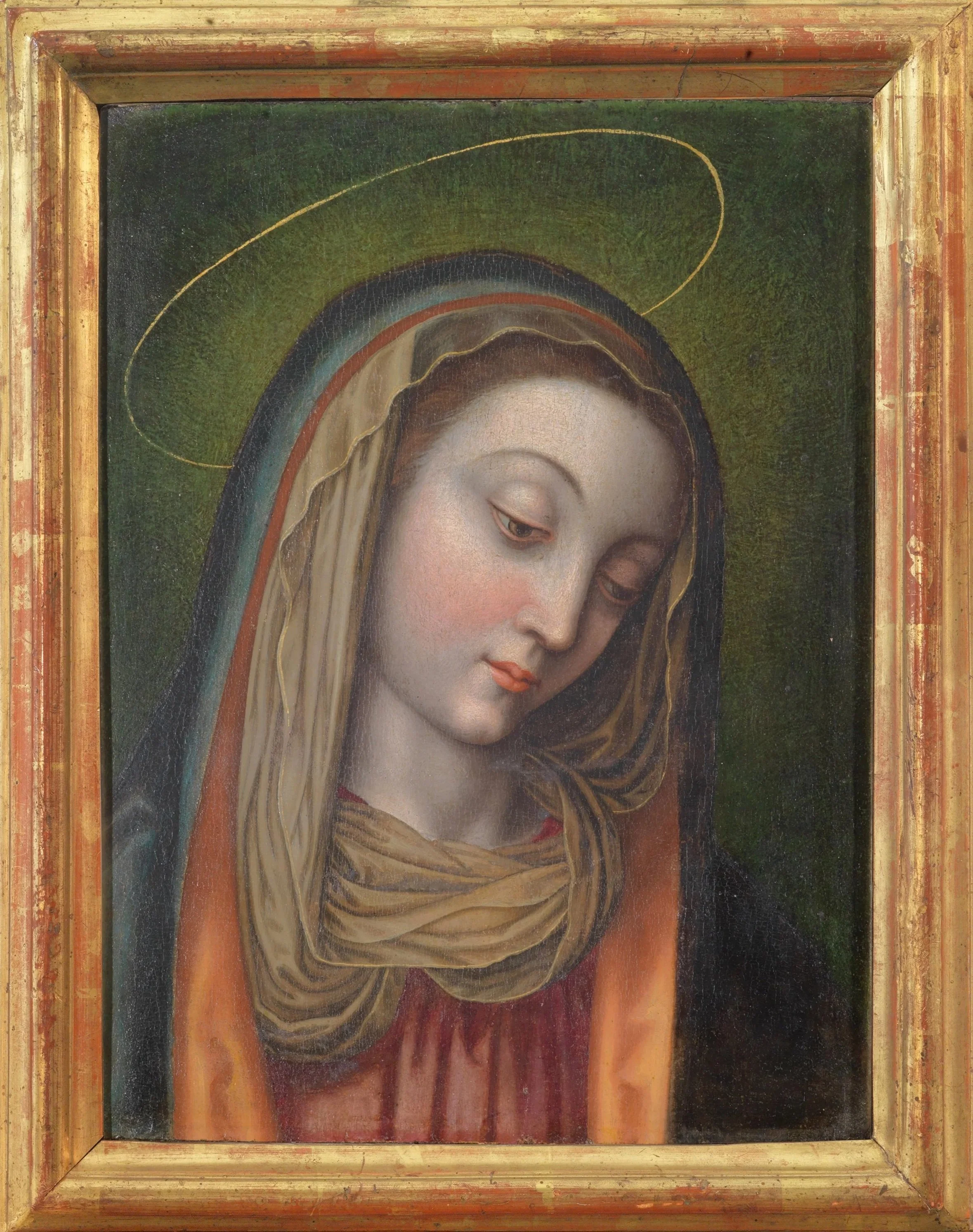 Haloed Virgin Mary in veil, with her bowed head tilted to the right against a dark green background