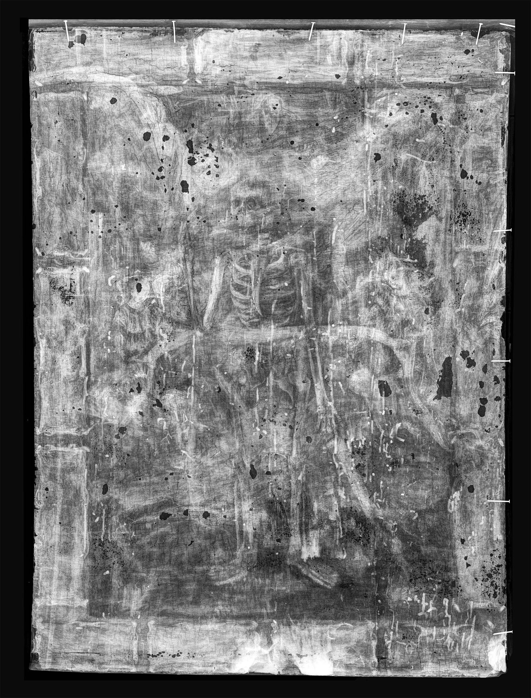Black and white x-radiograph of the present work showing hint of skeleton.