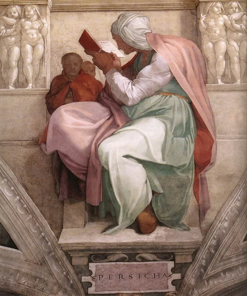 A woman seated reads from a book
