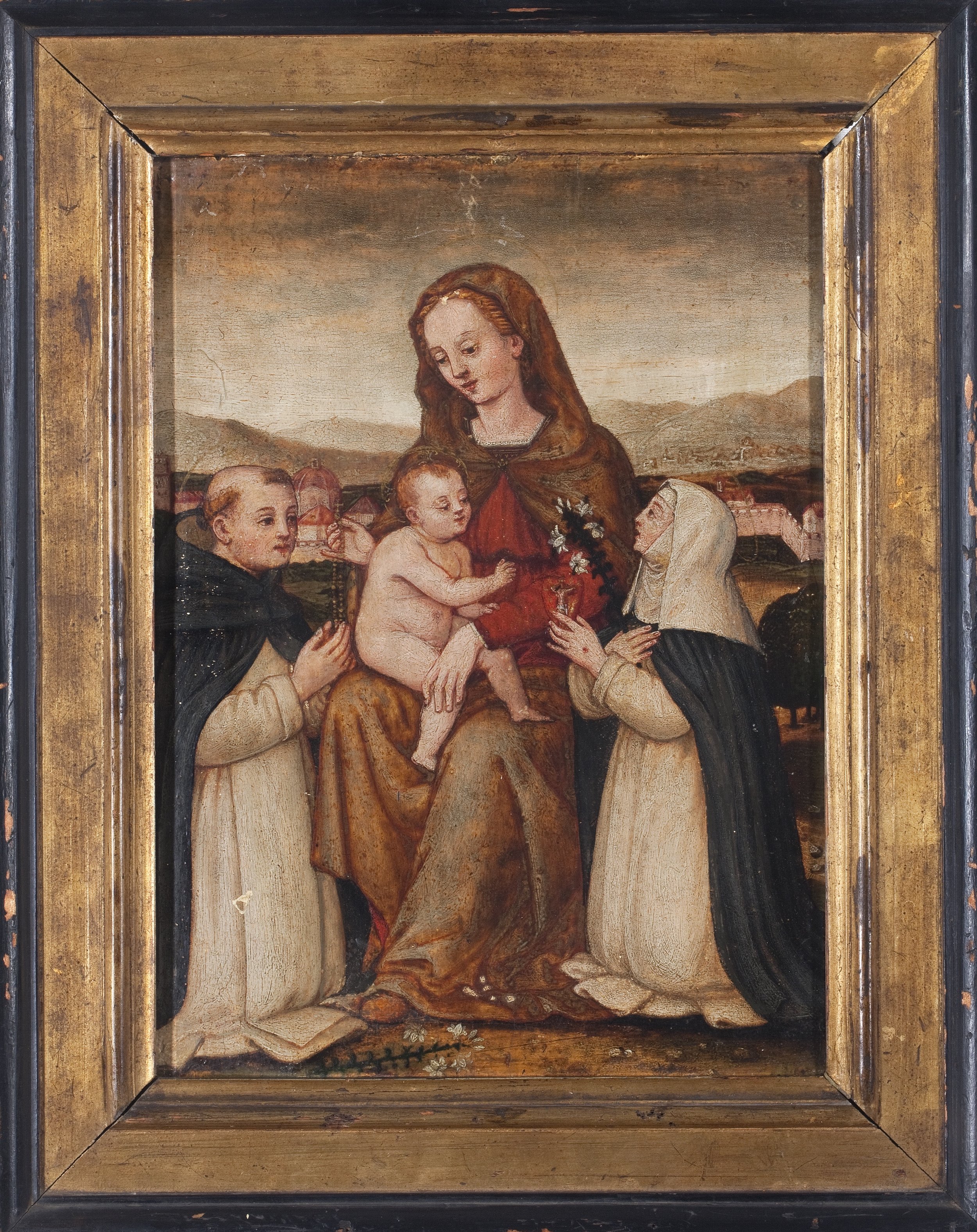Mary holds infant Christ between Saint Dominic and Catherine of Siena with a town behind