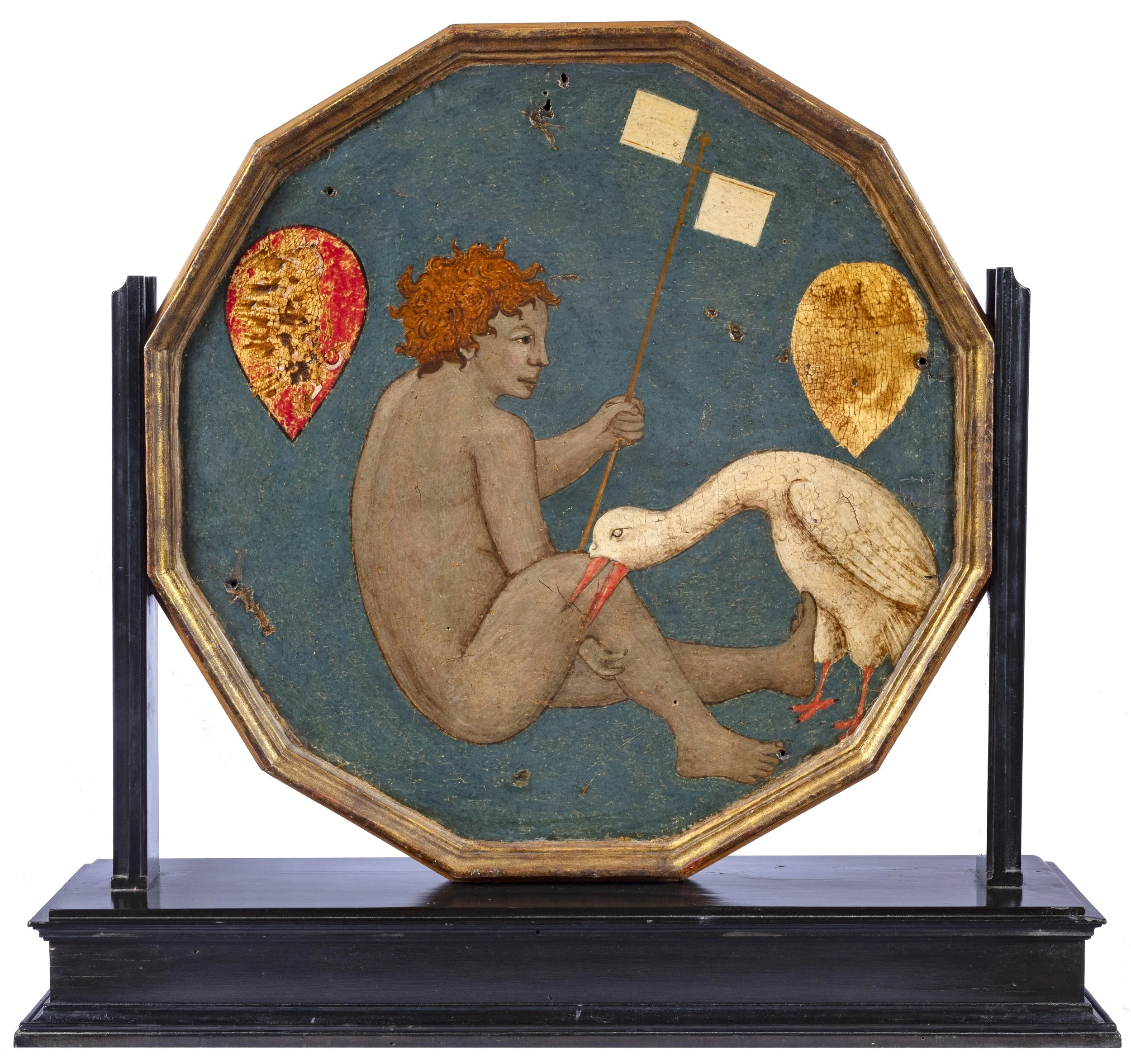 Octagonal golden tray showing a nude seated putto holding a flag beside a white goose