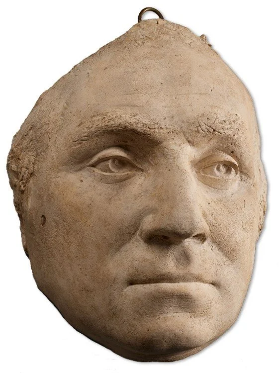 Plaster cast of a man's face.