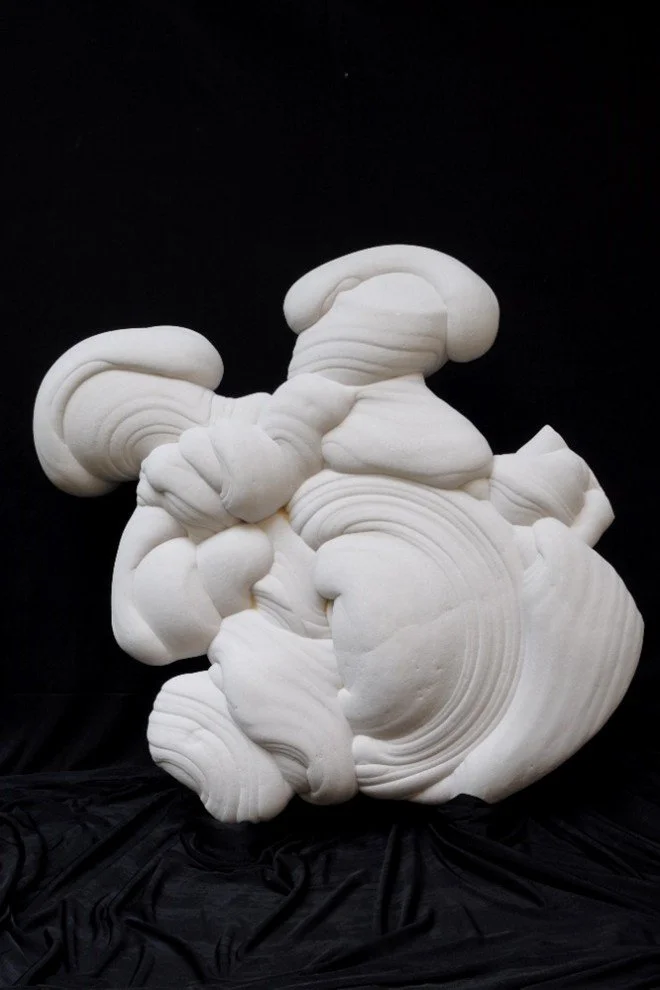 Reverse of bulbous white rock formation