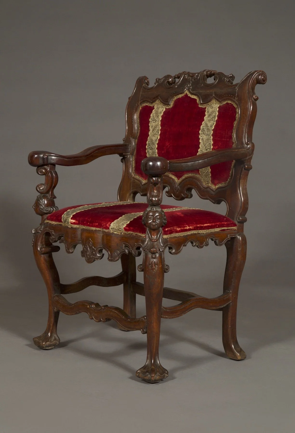Quarter view of the red velvet chair