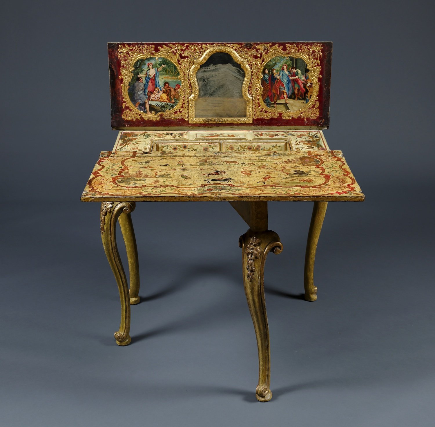 Frontal view of the present work fully opened showing the painted interior