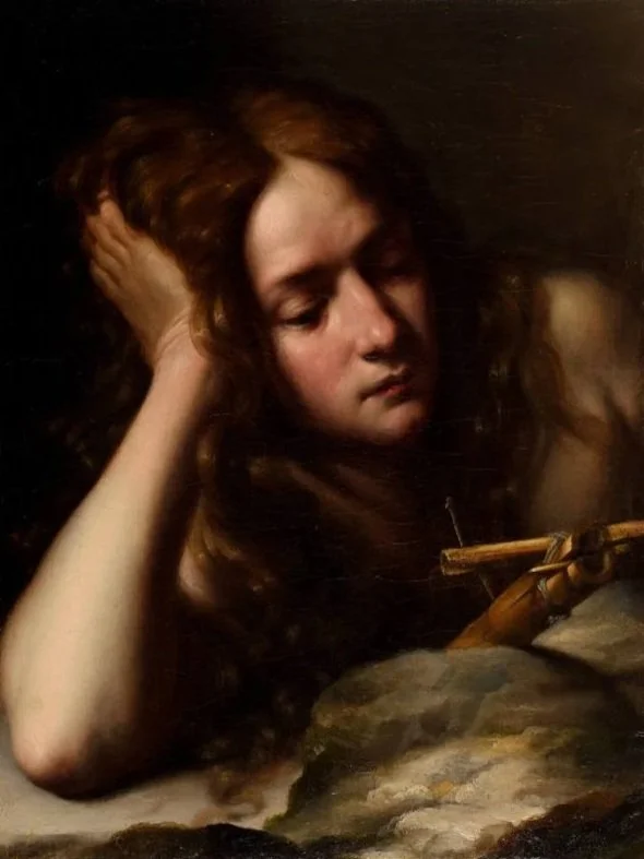 Female figure wistfully gazing at a small make-shift cross, with her elbow on the ground and her hand held to her head.