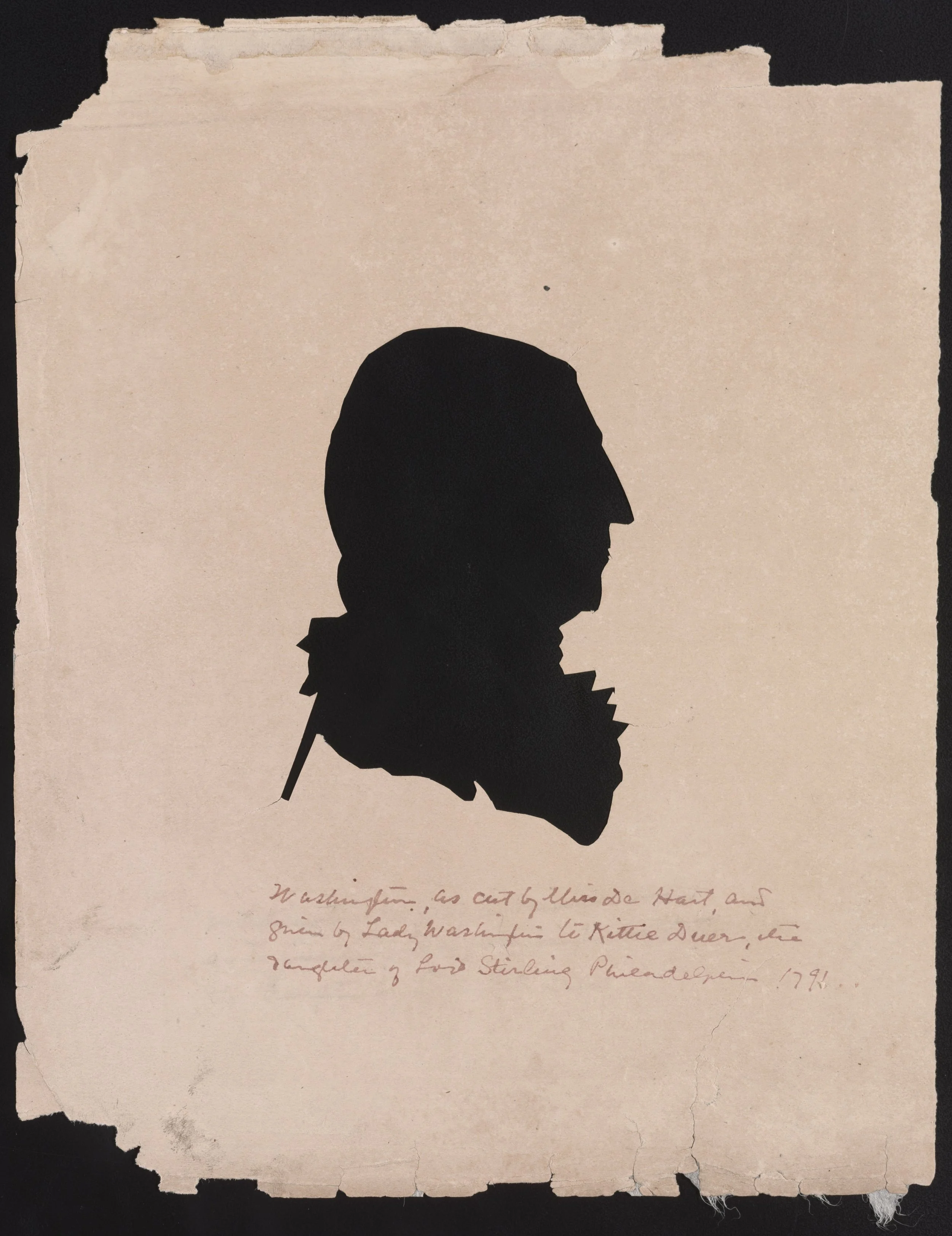 Silhouette of profile of George Washington looking at right