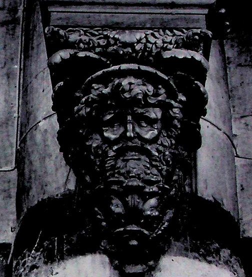 Bronze statue in shape of a bearded man