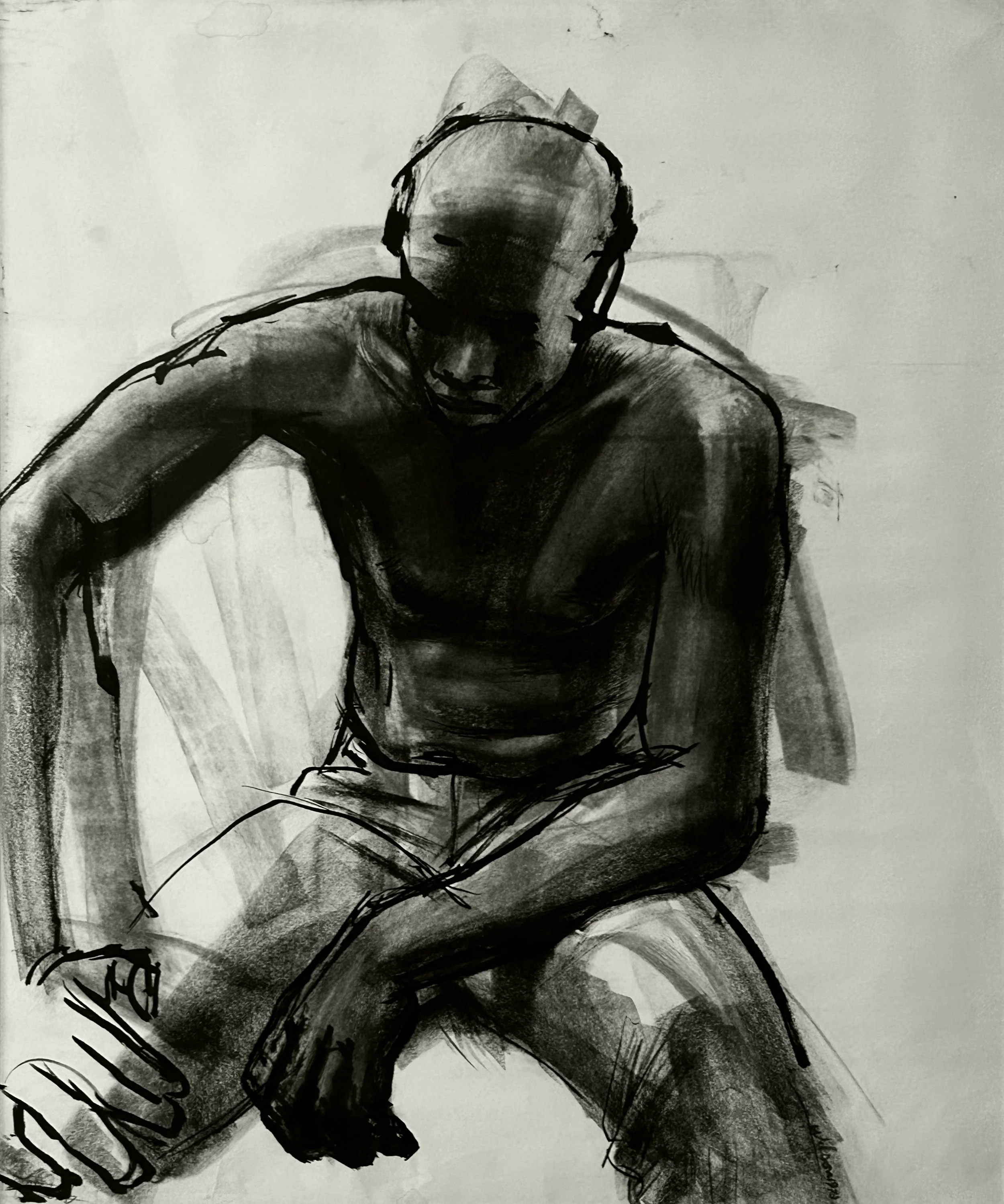 Sketch of a half-naked black man seated resting his hands on his legs