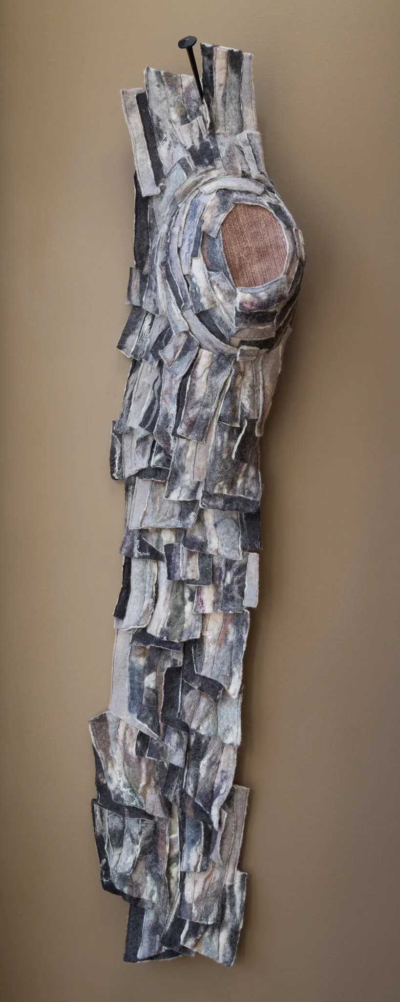 wounded handmade felt, mixed media 50 x 13 x 5