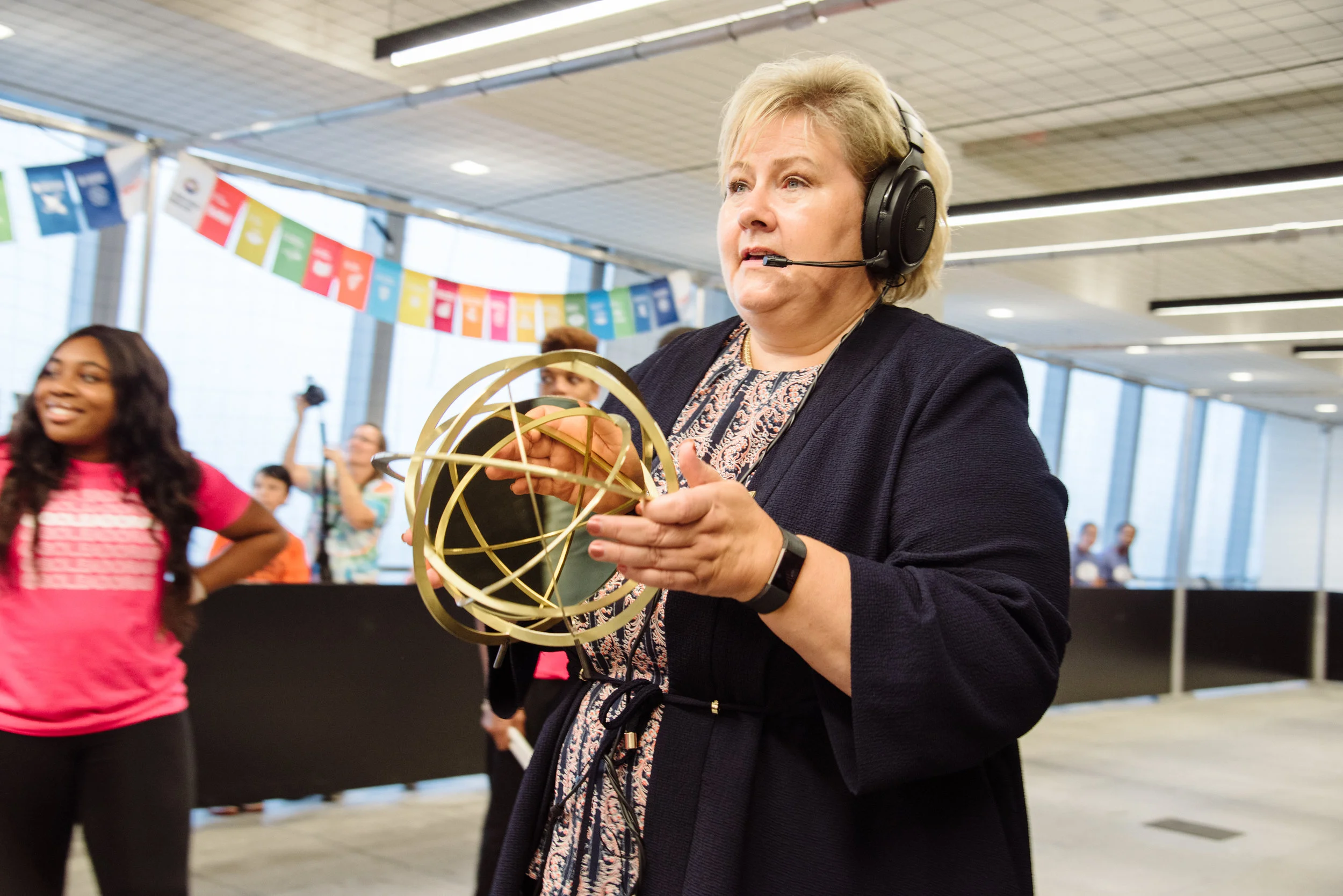 Prime Minister of Norway Erna Solberg handing us the GGWCUP trophy