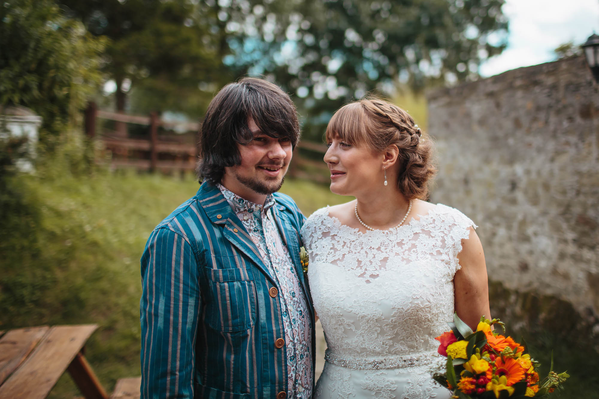 Bride and groom portrait at Craven Arms Cruck Barn in Yorkshire