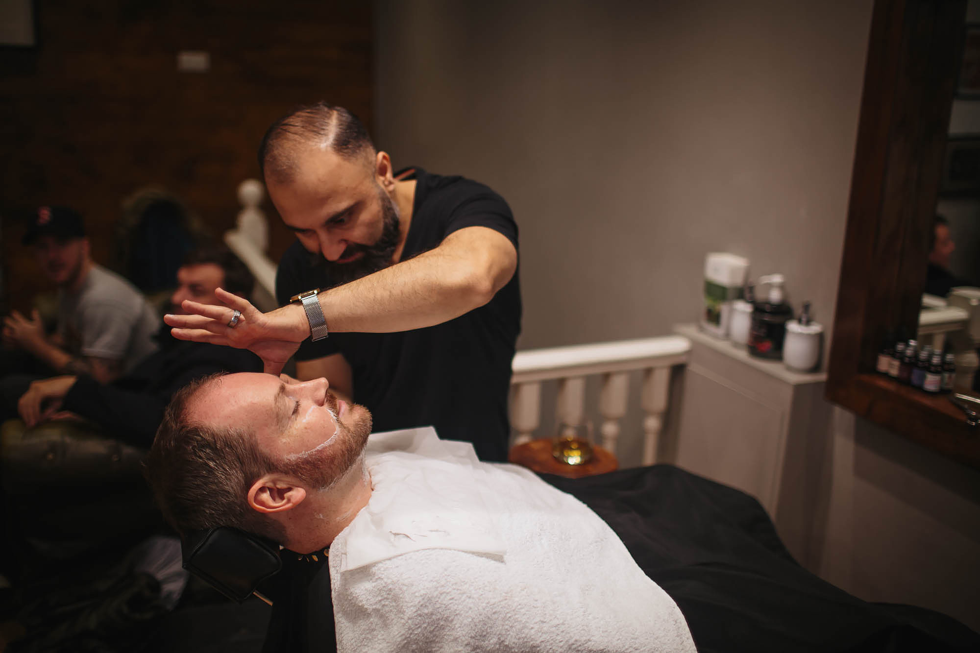 Groom has a wet shave for his wedding at Remedy Hairdressers