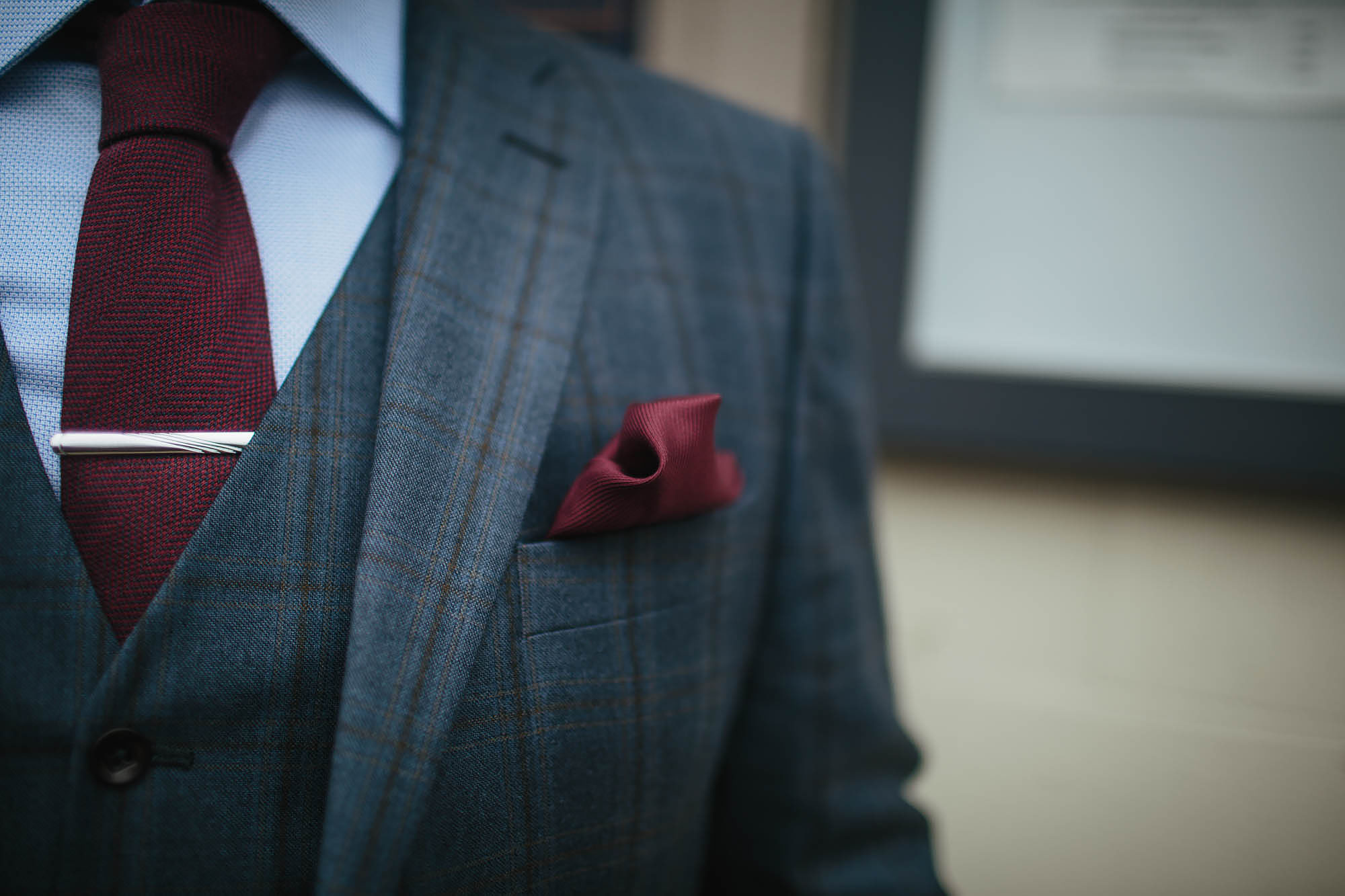 Close up of the grooms suit at Leeds City Centre