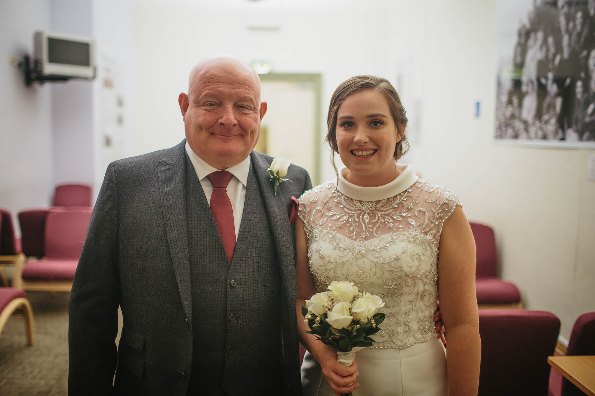 Bride and her father at a wedding in Leeds Town Hall