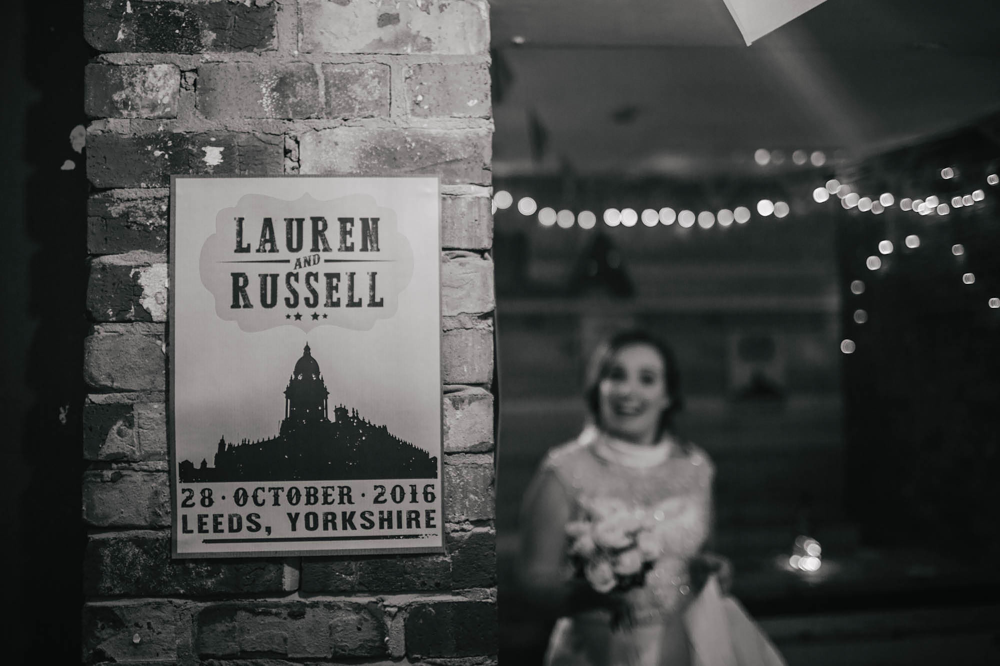 Bride and a poster in Sela Bar Leeds at a wedding