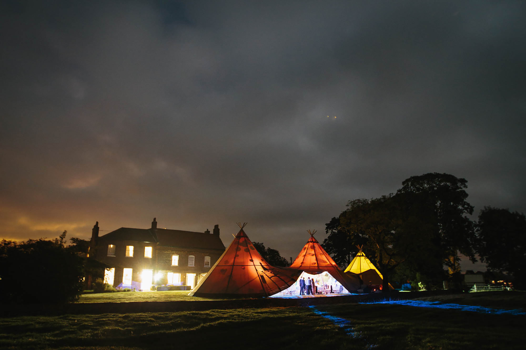 Night time photo of Hornington Manor and tipi at a wedding in Yorkshire