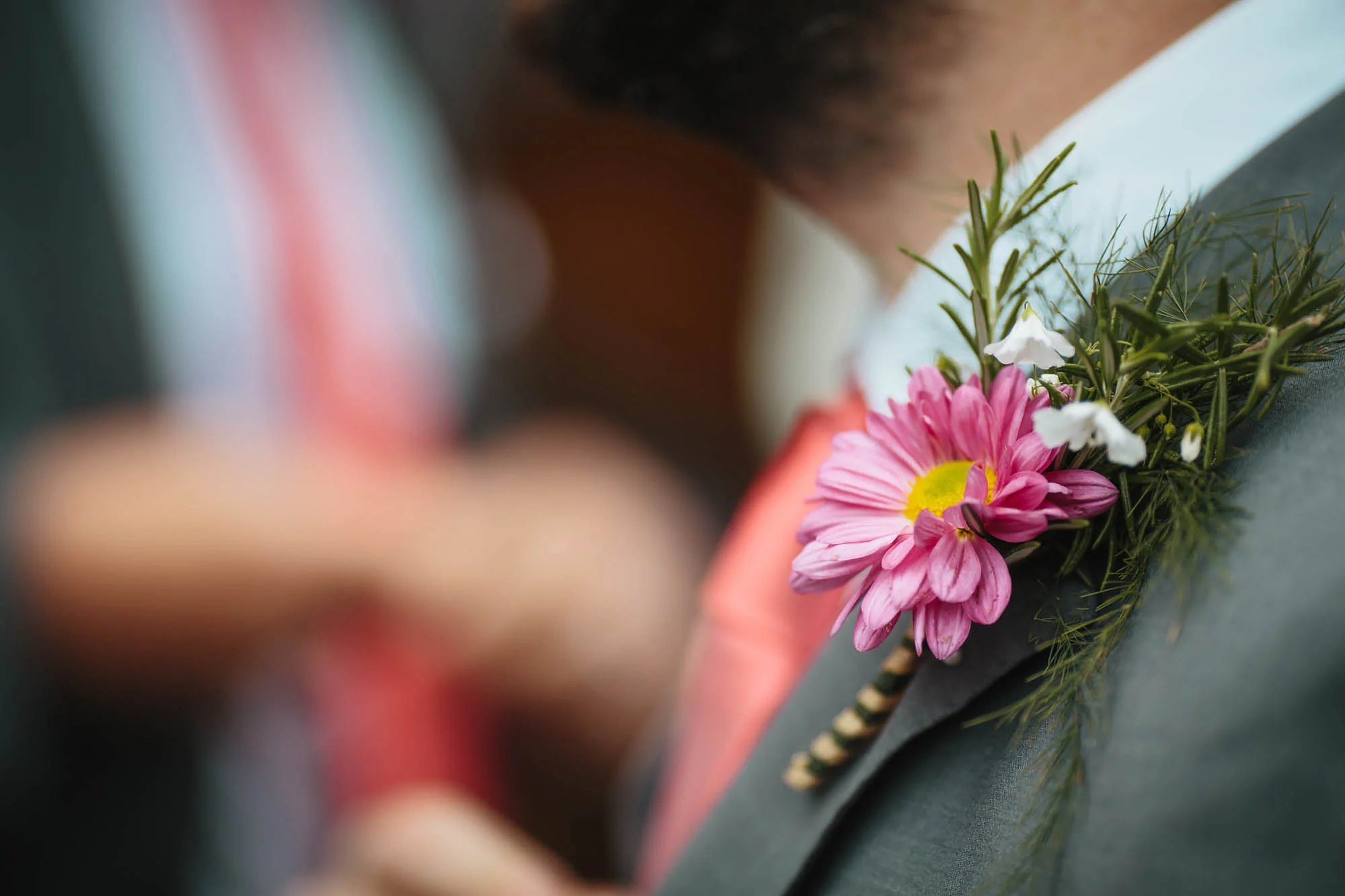 Close up of the wedding flowers as a buttonhole
