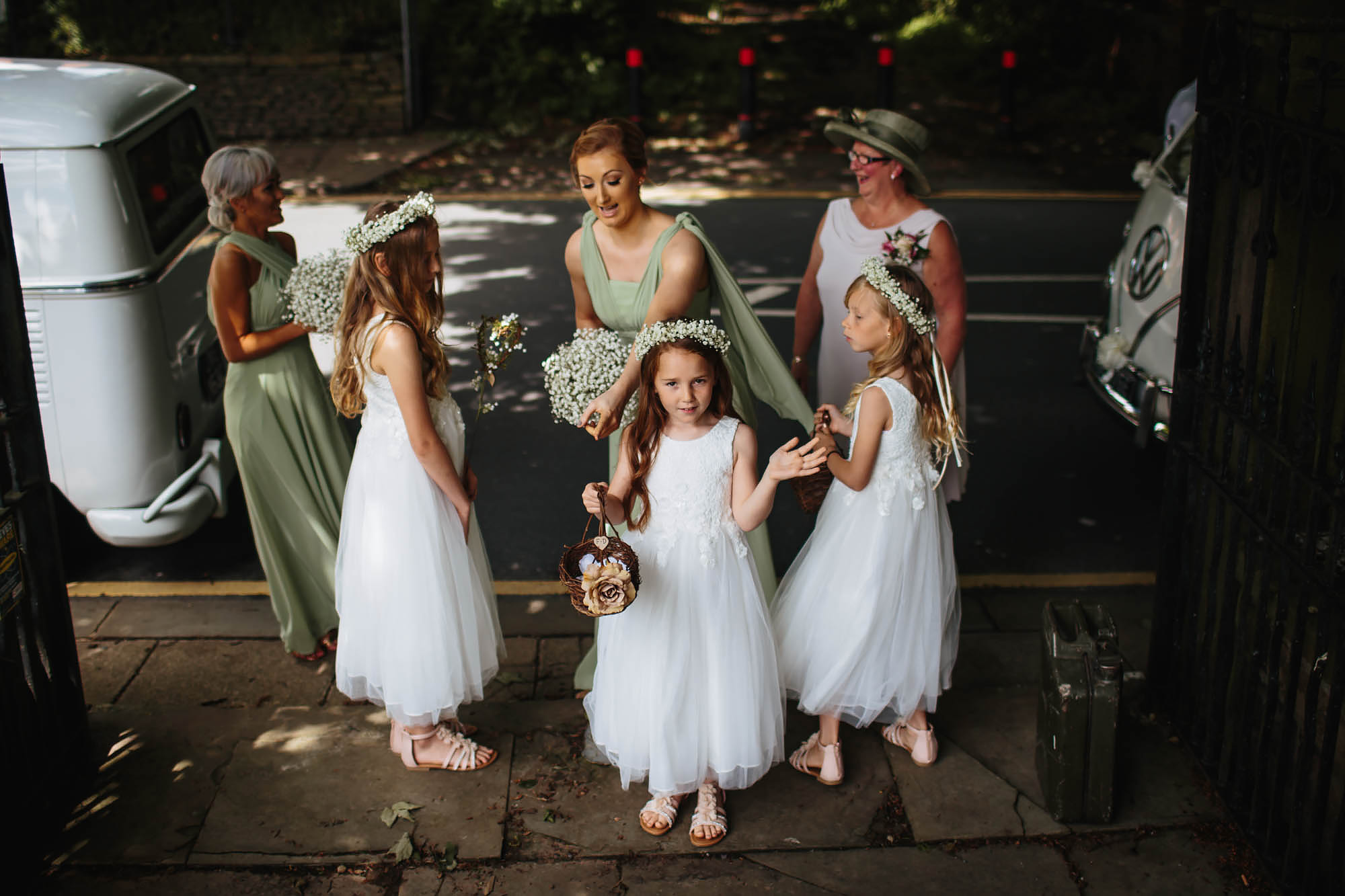 Bridesmaids and flower girls arrive at a wedding in Manchester
