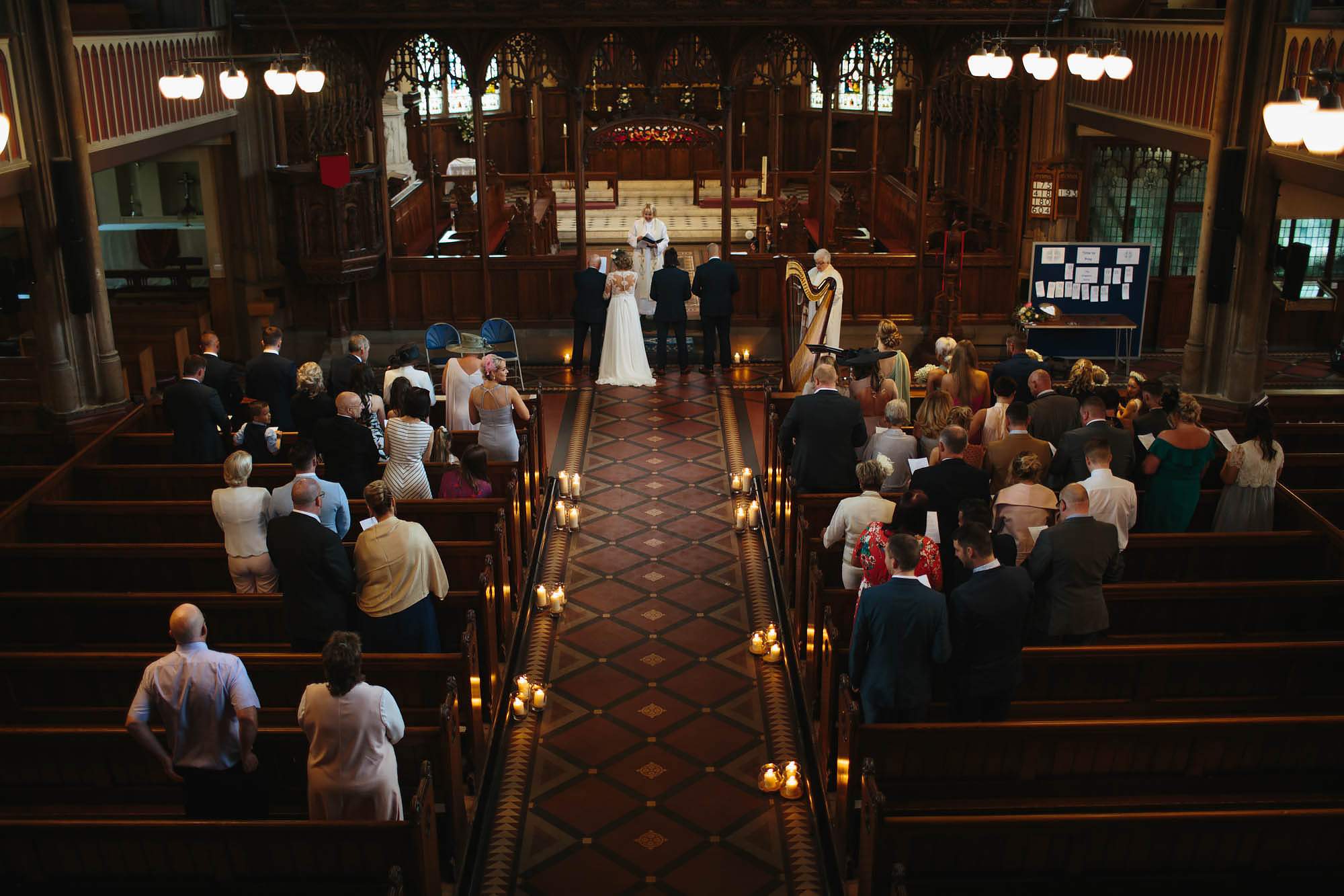 Bride and groom getting married in a church in Manchester