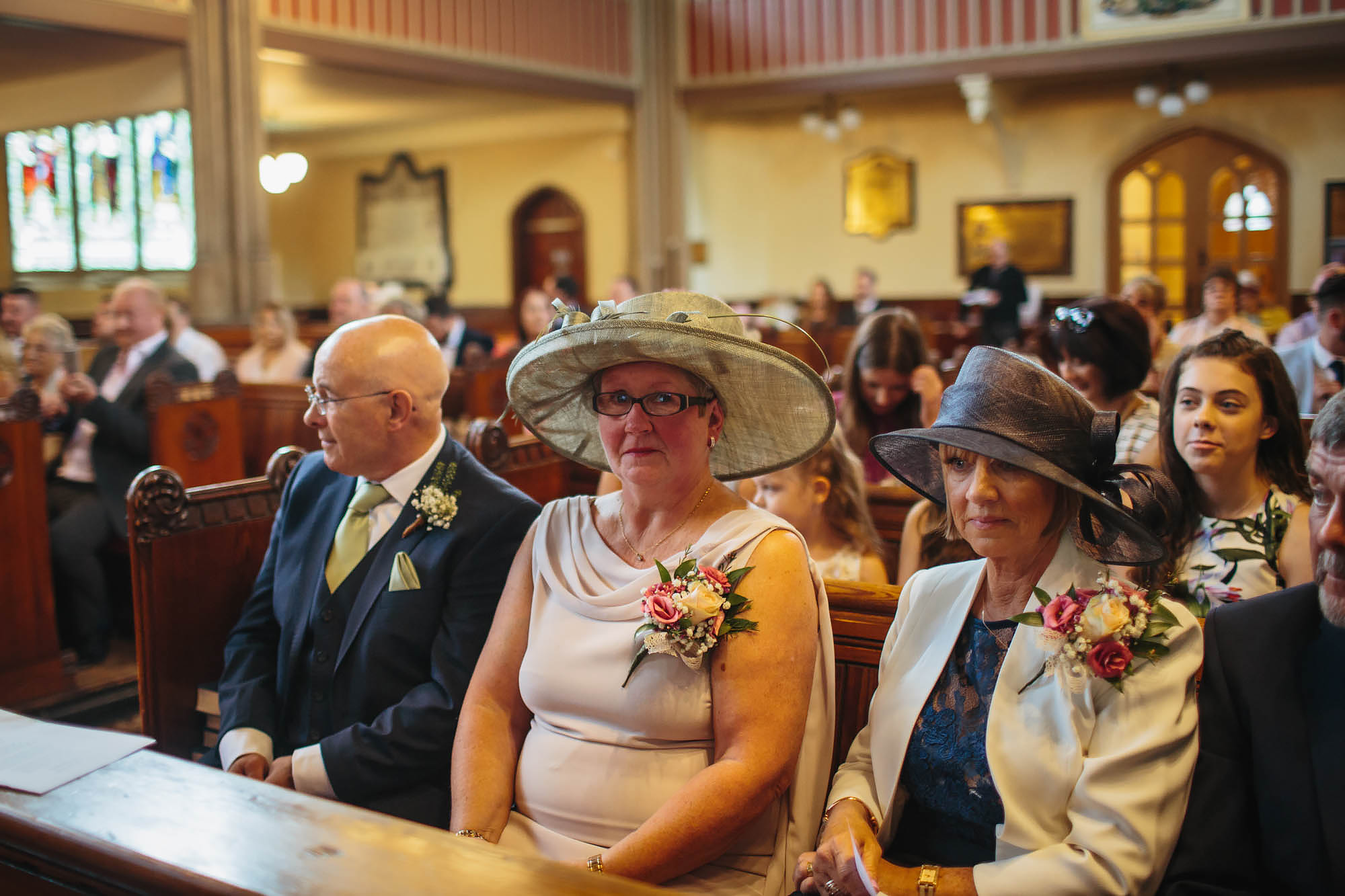 Mother cries in church at her daughter's wedding