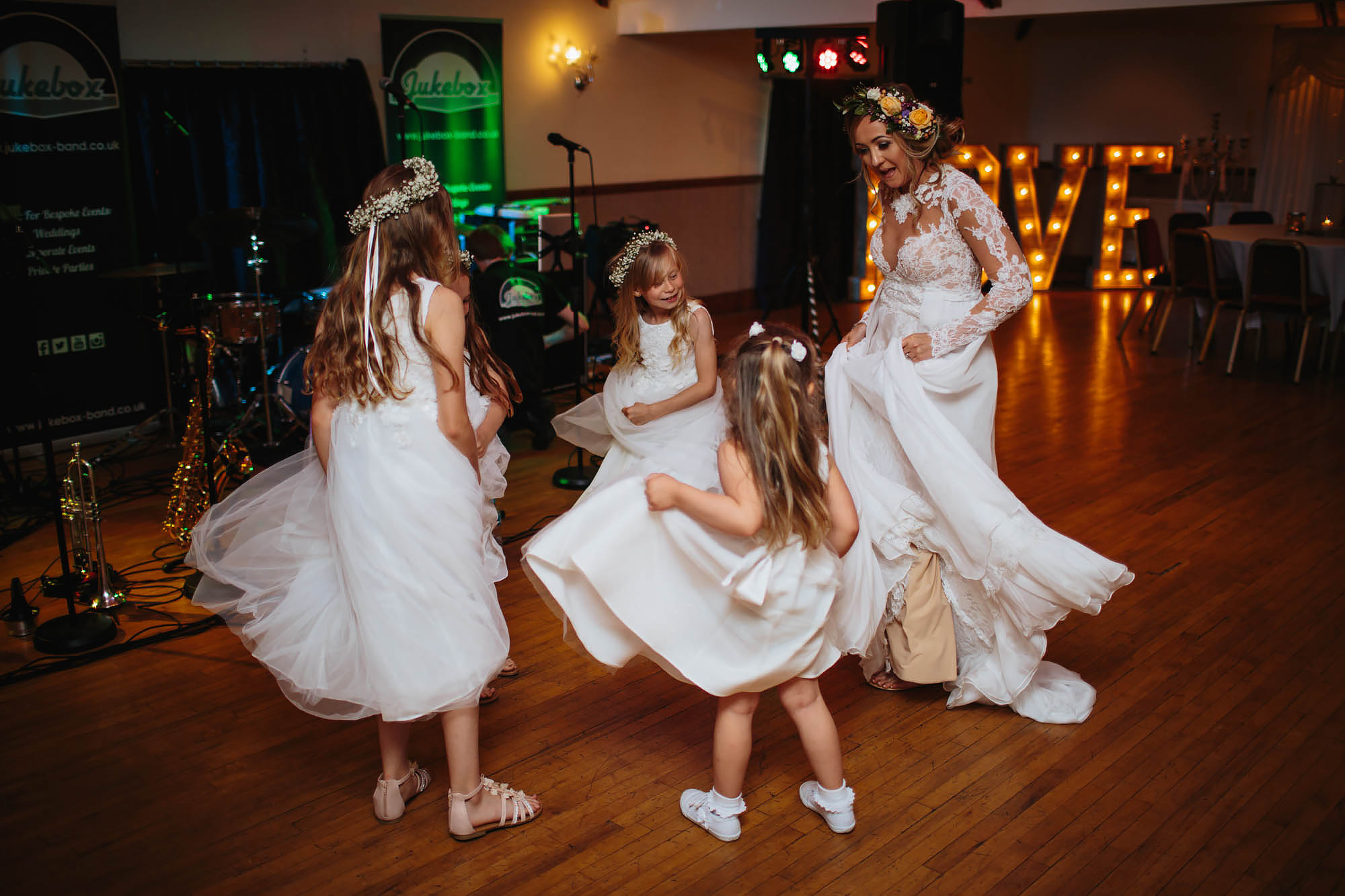 Bride and bridesmaids dancing at a wedding in Manchester