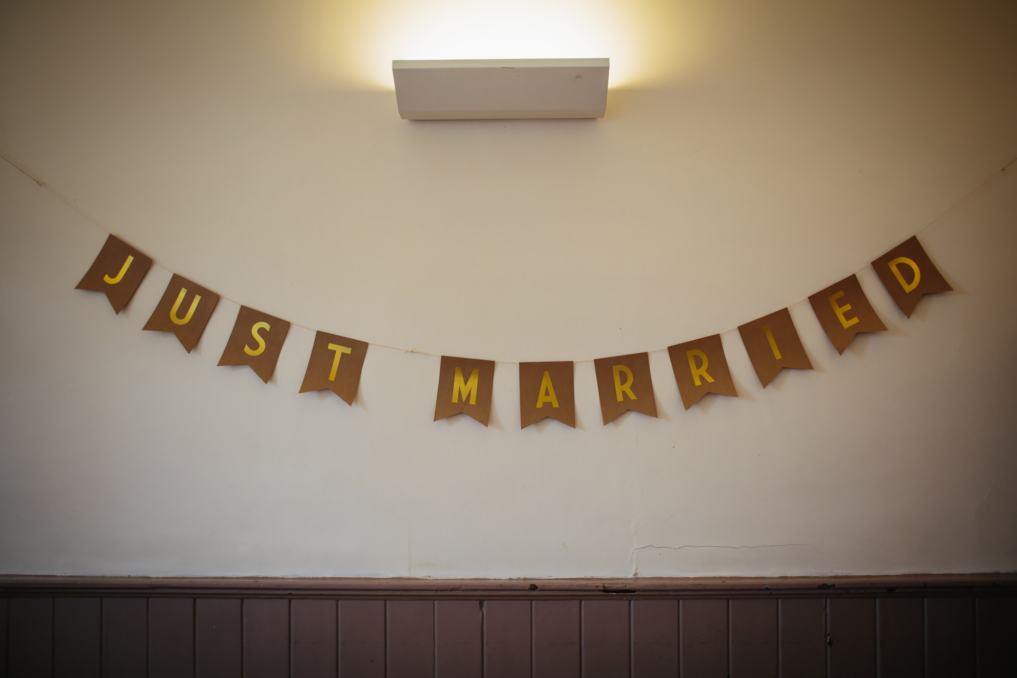 Just married sign at a village hall wedding