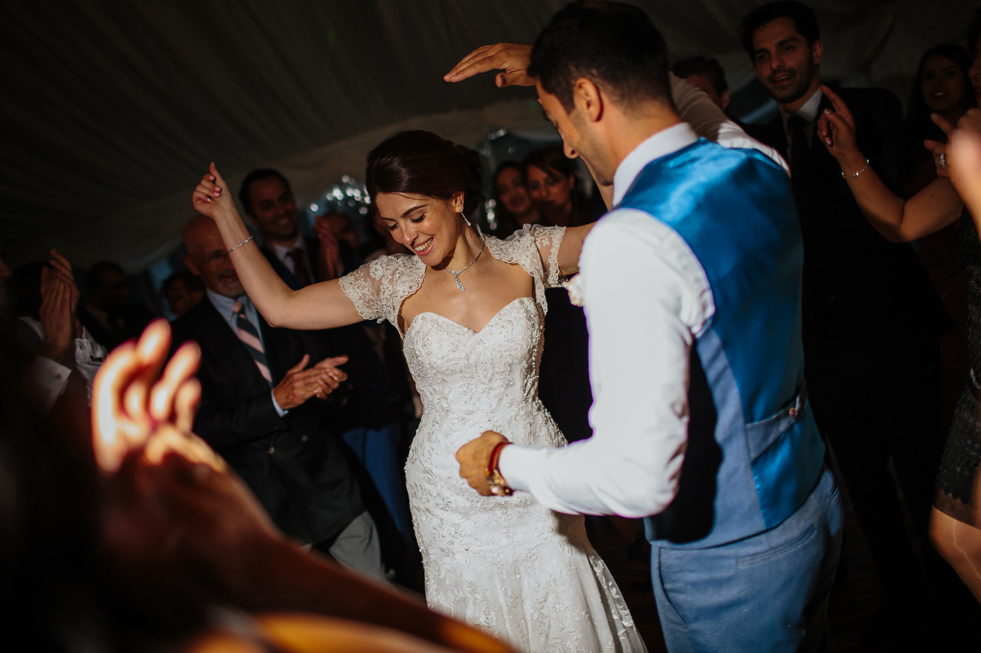 Bride and groom dancing at wedding