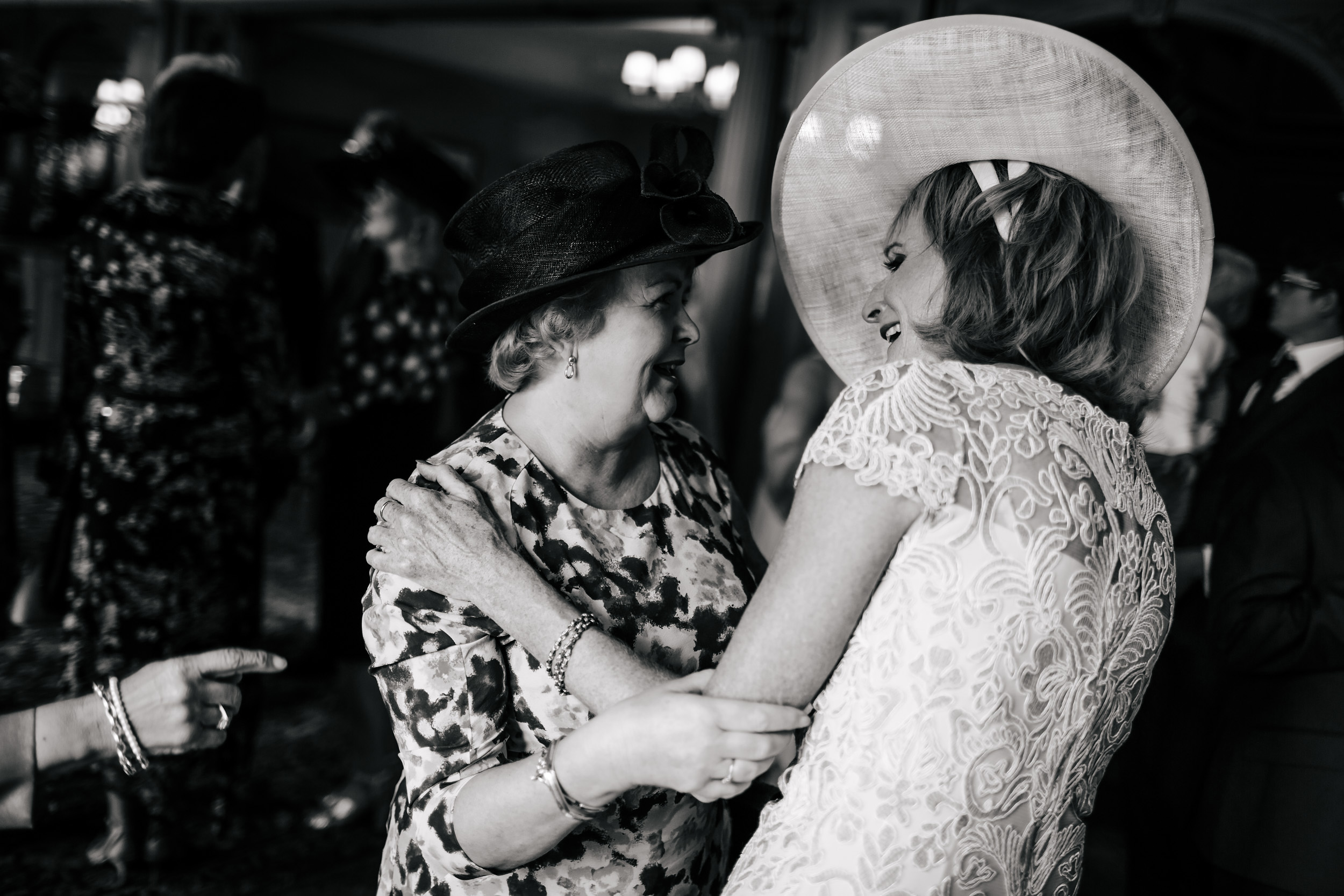 Brides mother laughs at her wedding at Thornton Manor Cheshire