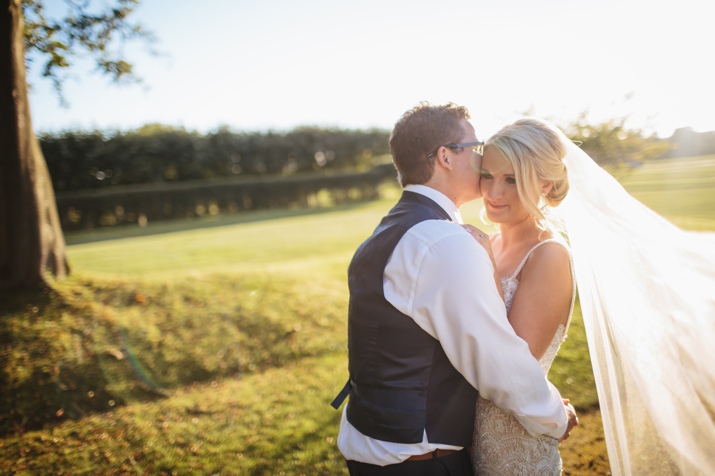 Bride and groom portrait at Thornton Manor Cheshire sunset