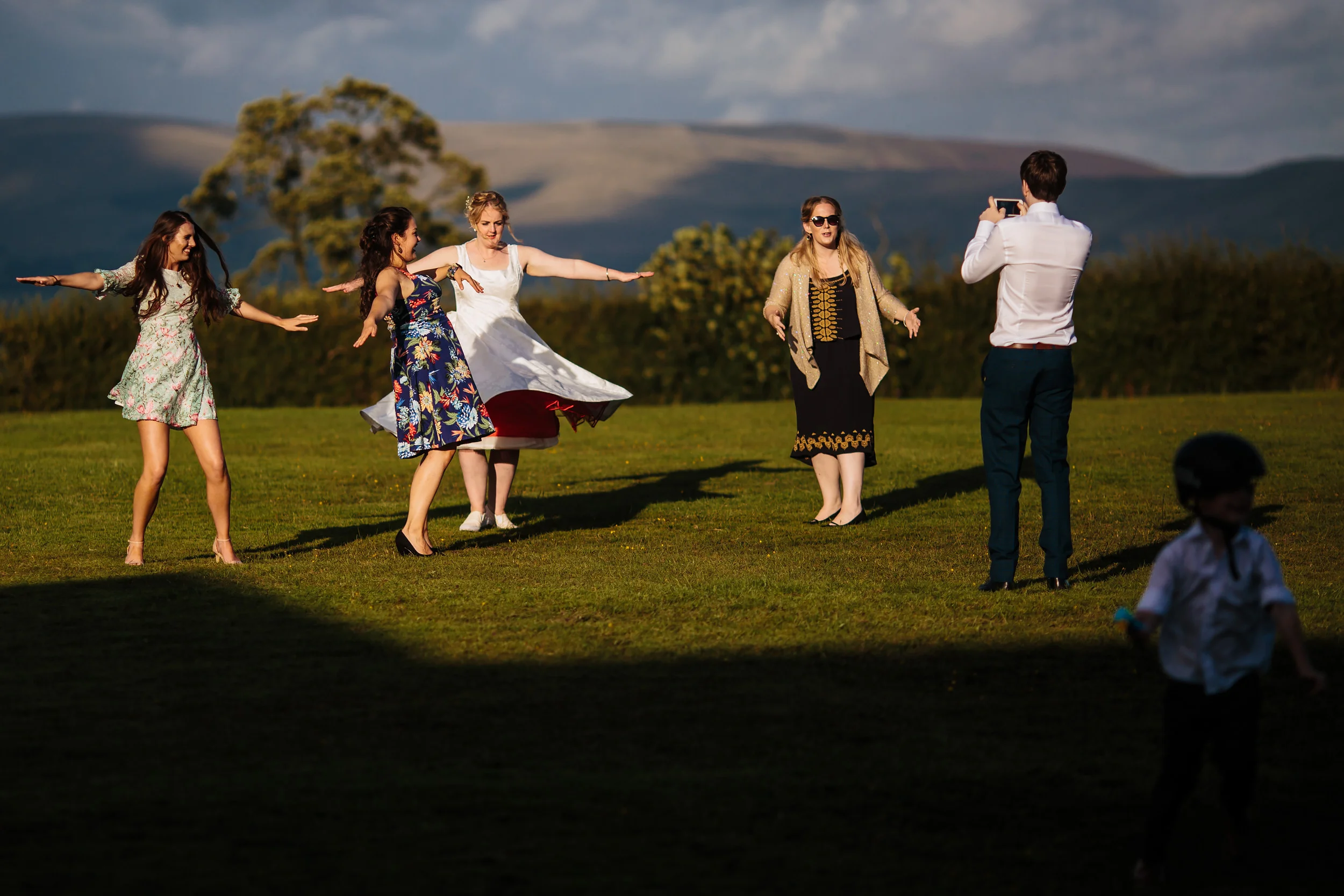 Bride spinning in the garden on her wedding day in Lancashire