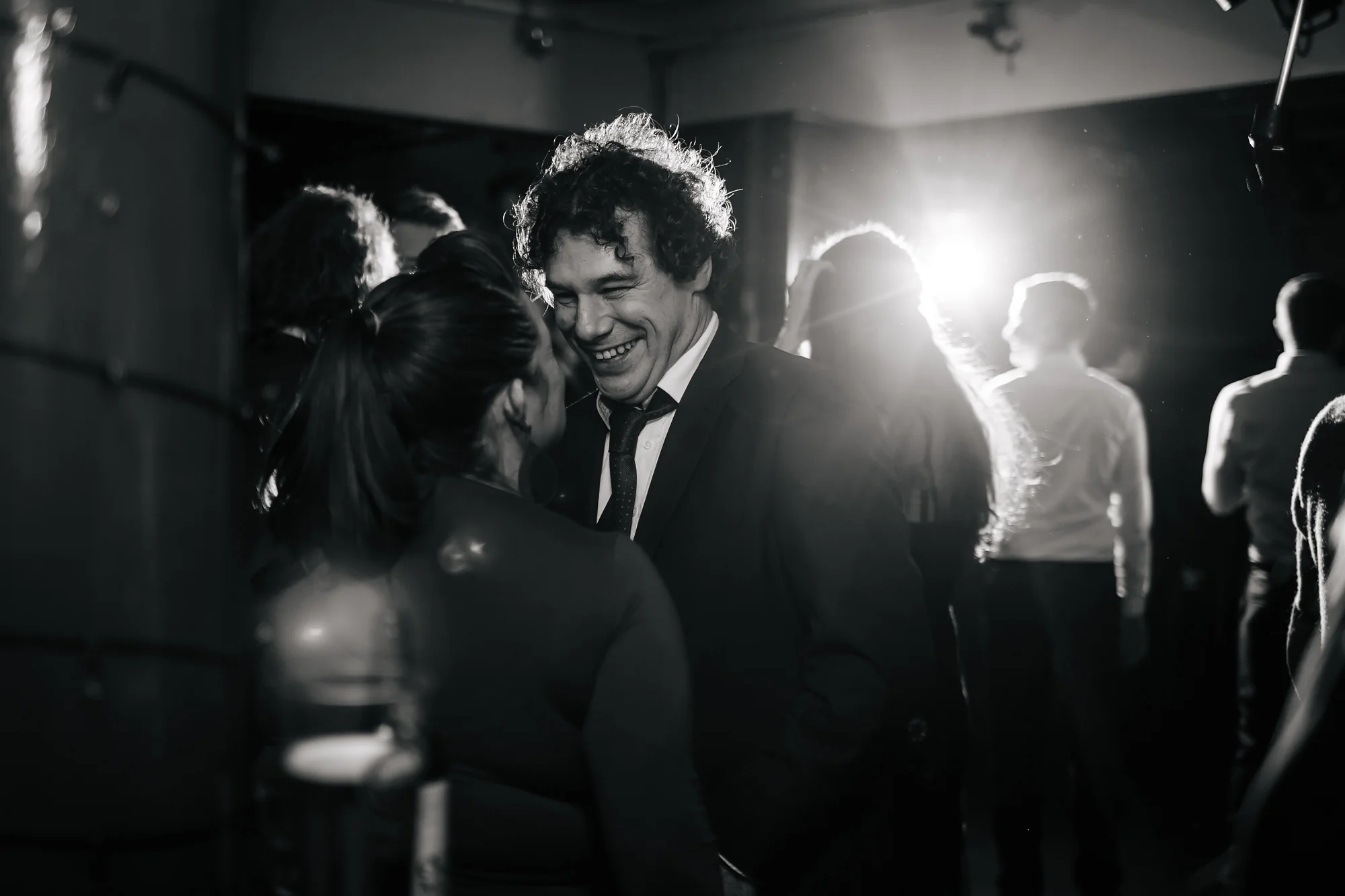Wedding guests laughing at the Faversham Leeds