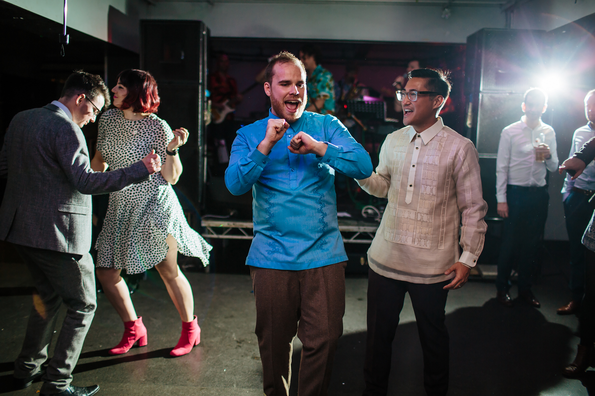 Grooms dancing at a gay wedding in Leeds