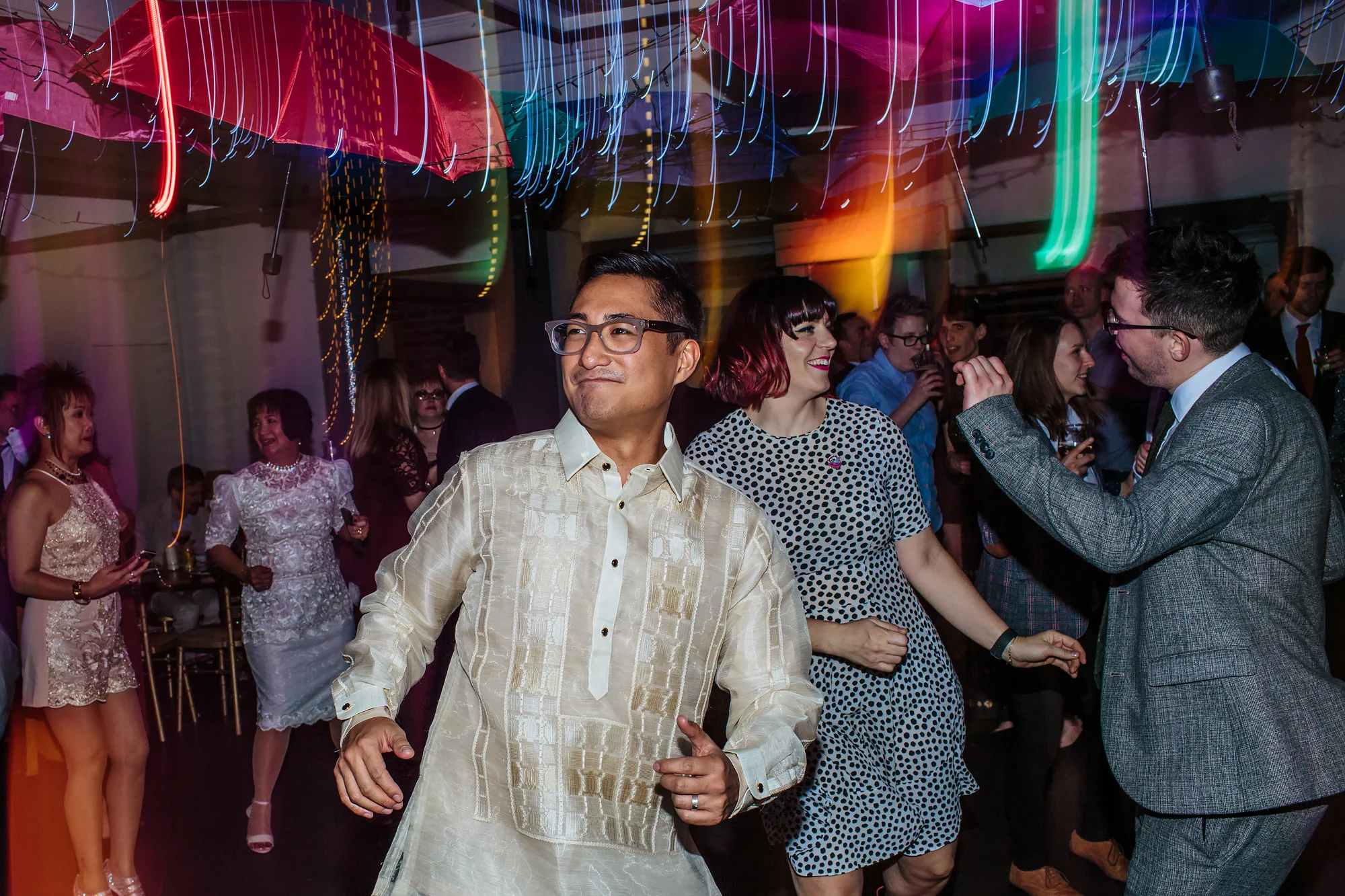 Groom dancing at a wedding at The Faversham Leeds