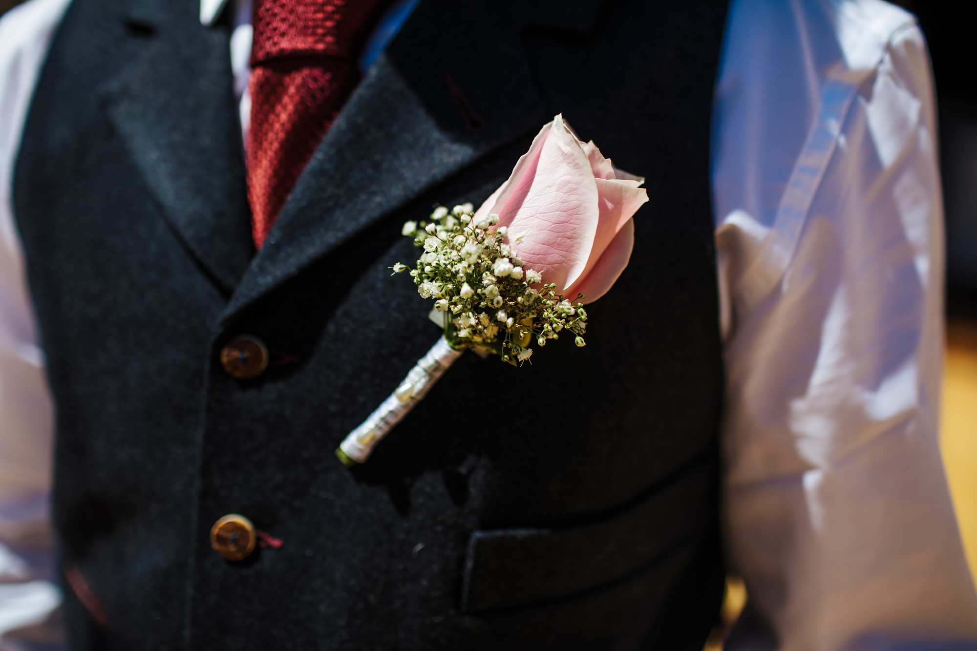 Close up of a buttonhole in Spain at a wedding