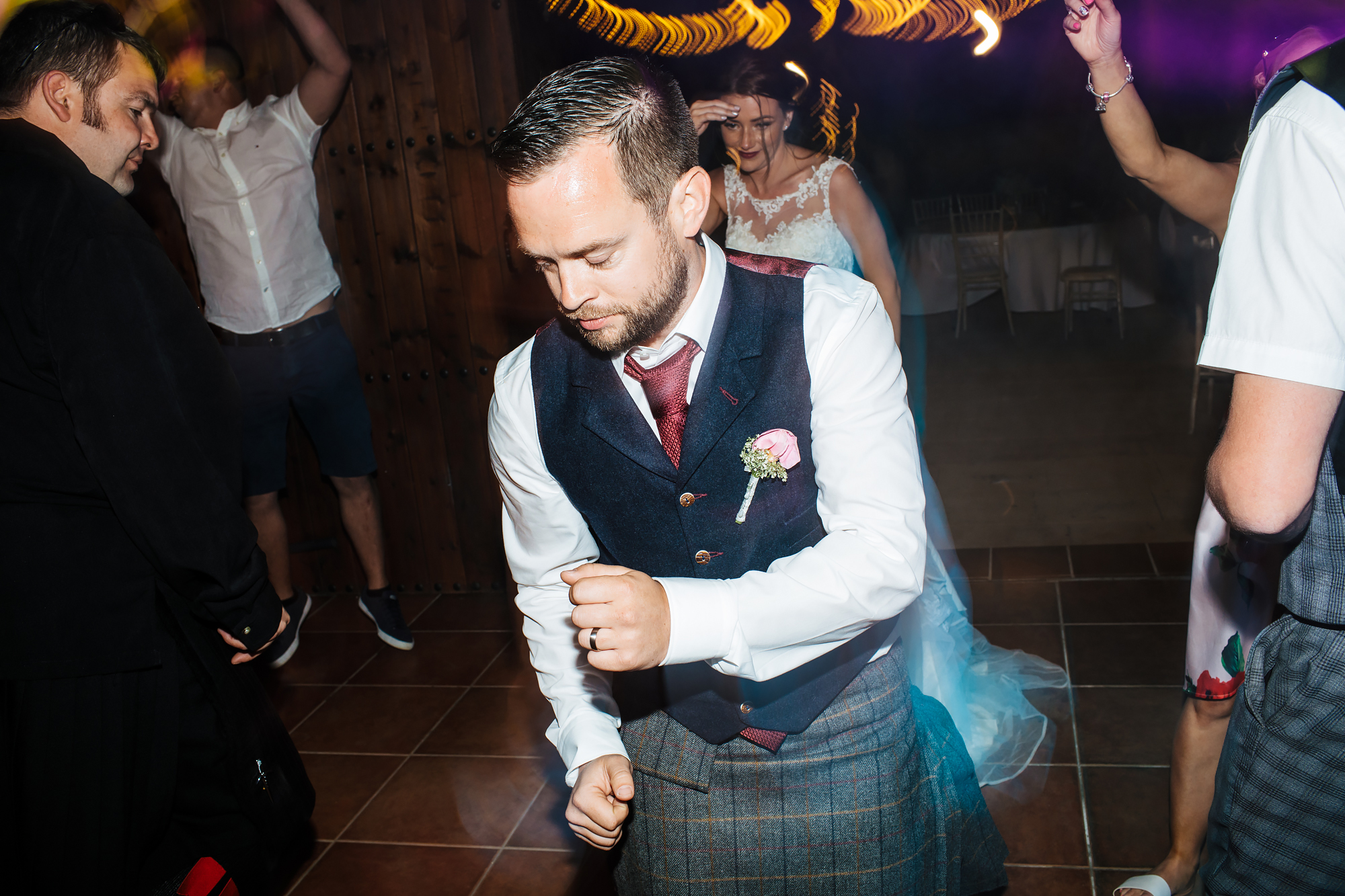 Groom dancing at a wedding in Nerja Spain