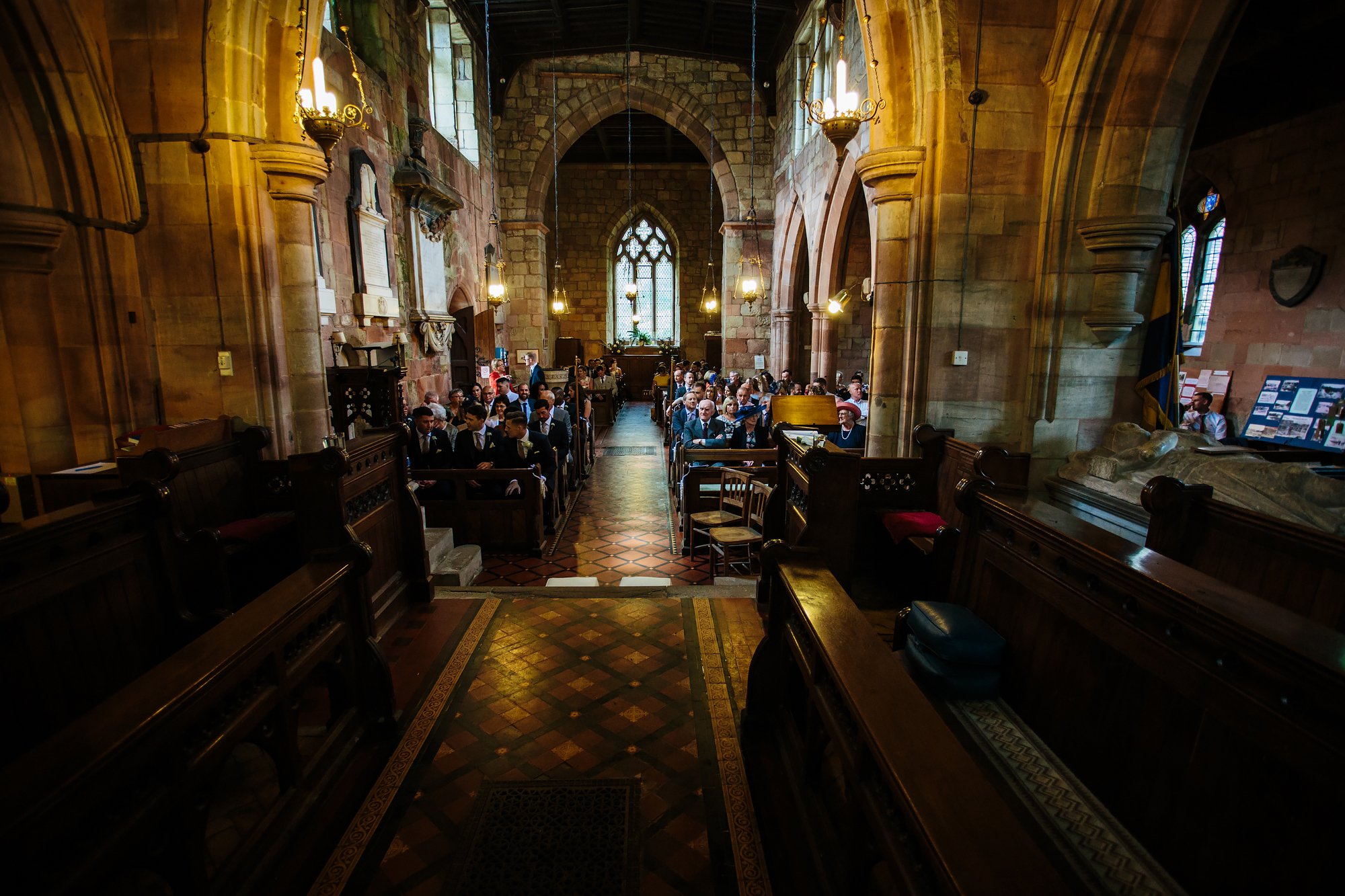 Guests at a church wedding in Shropshire