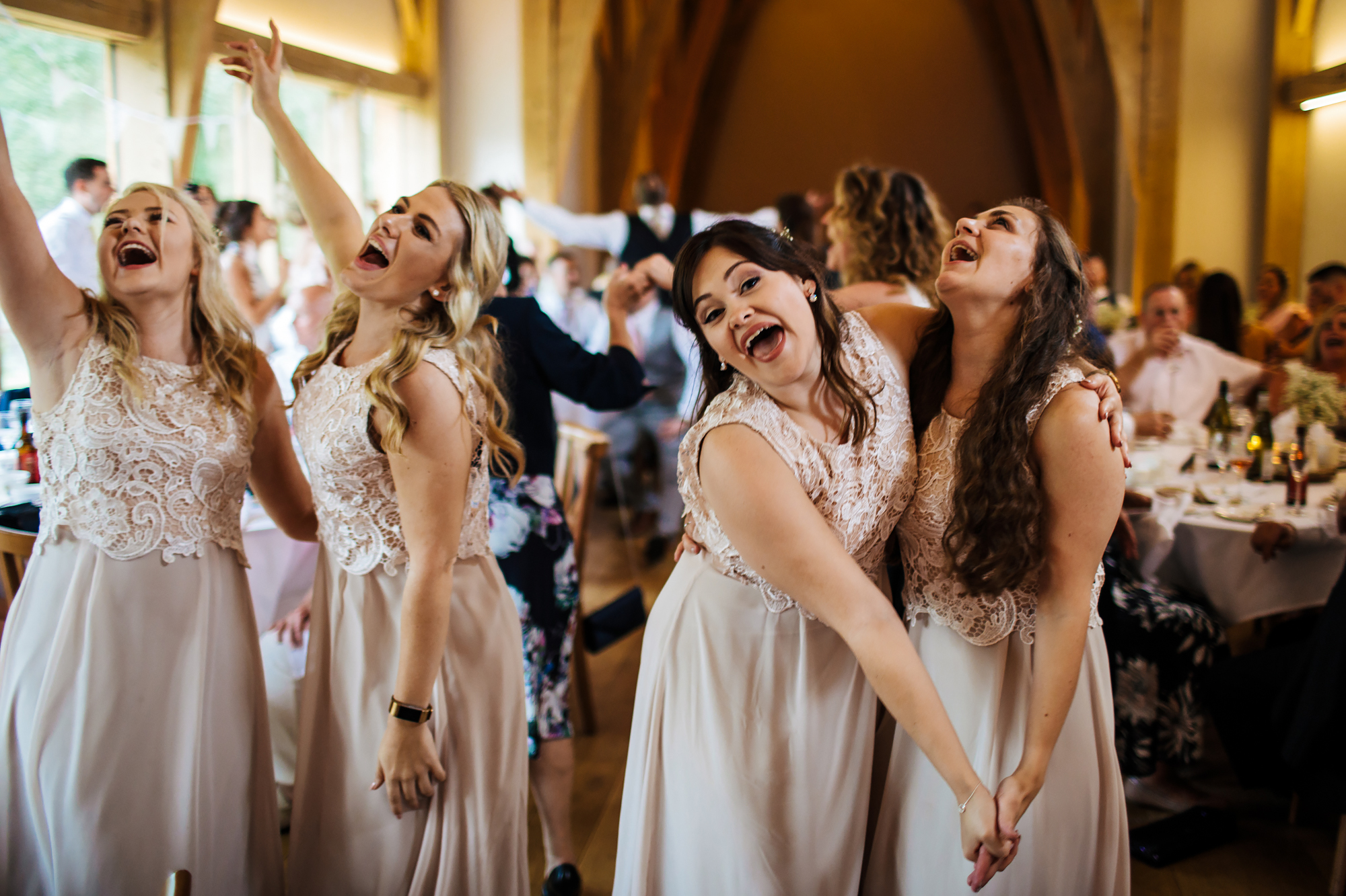Dancing bridesmaids at Mill Barns Wedding Venue Shropshire