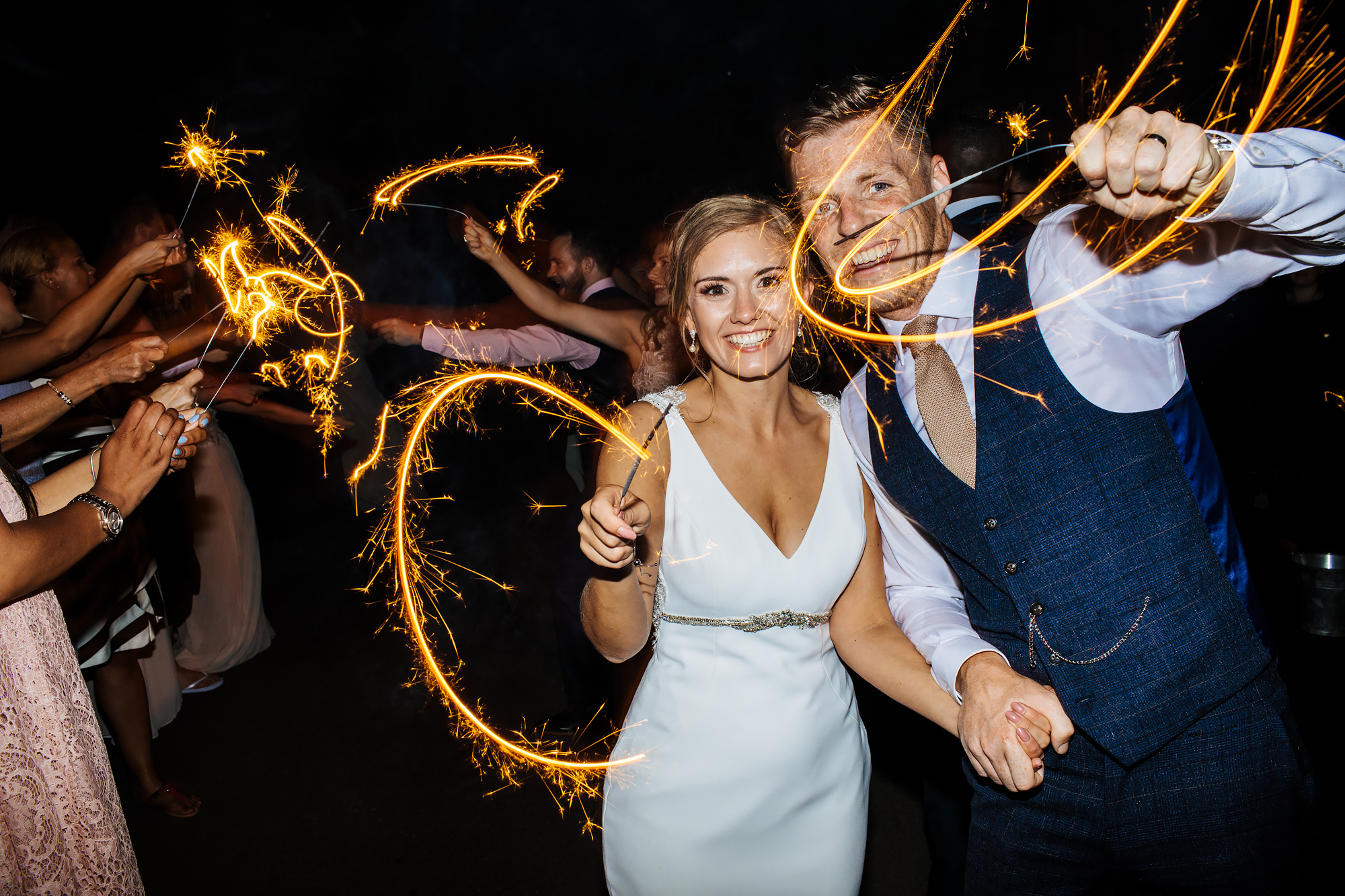 Bride and groom with sparklers at Mill Barns Wedding Venue Shropshire
