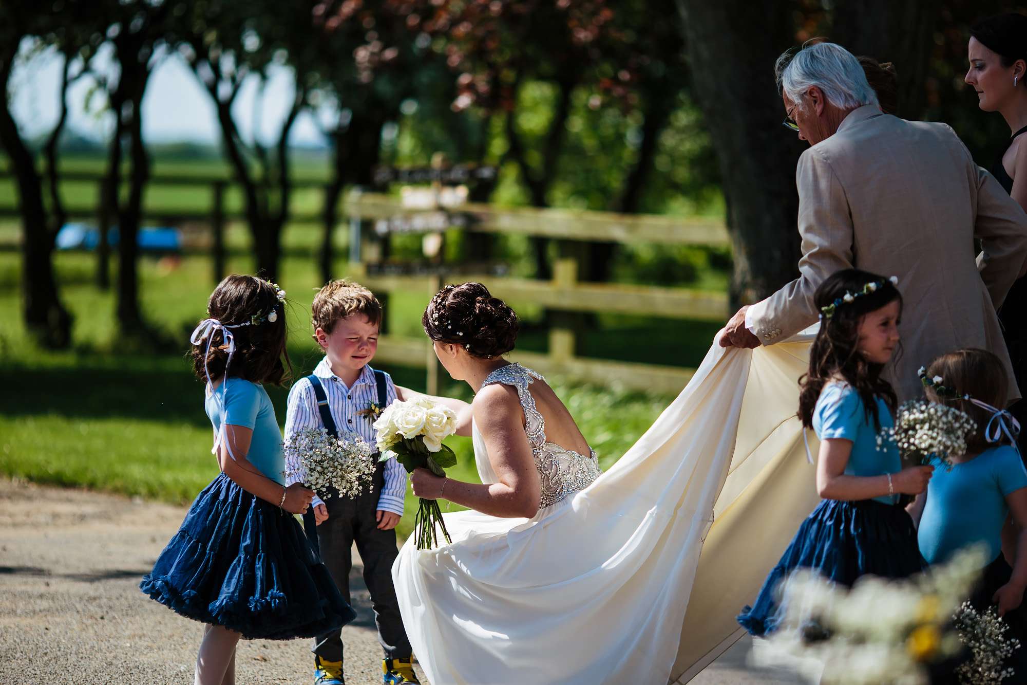 Crying child at a wedding