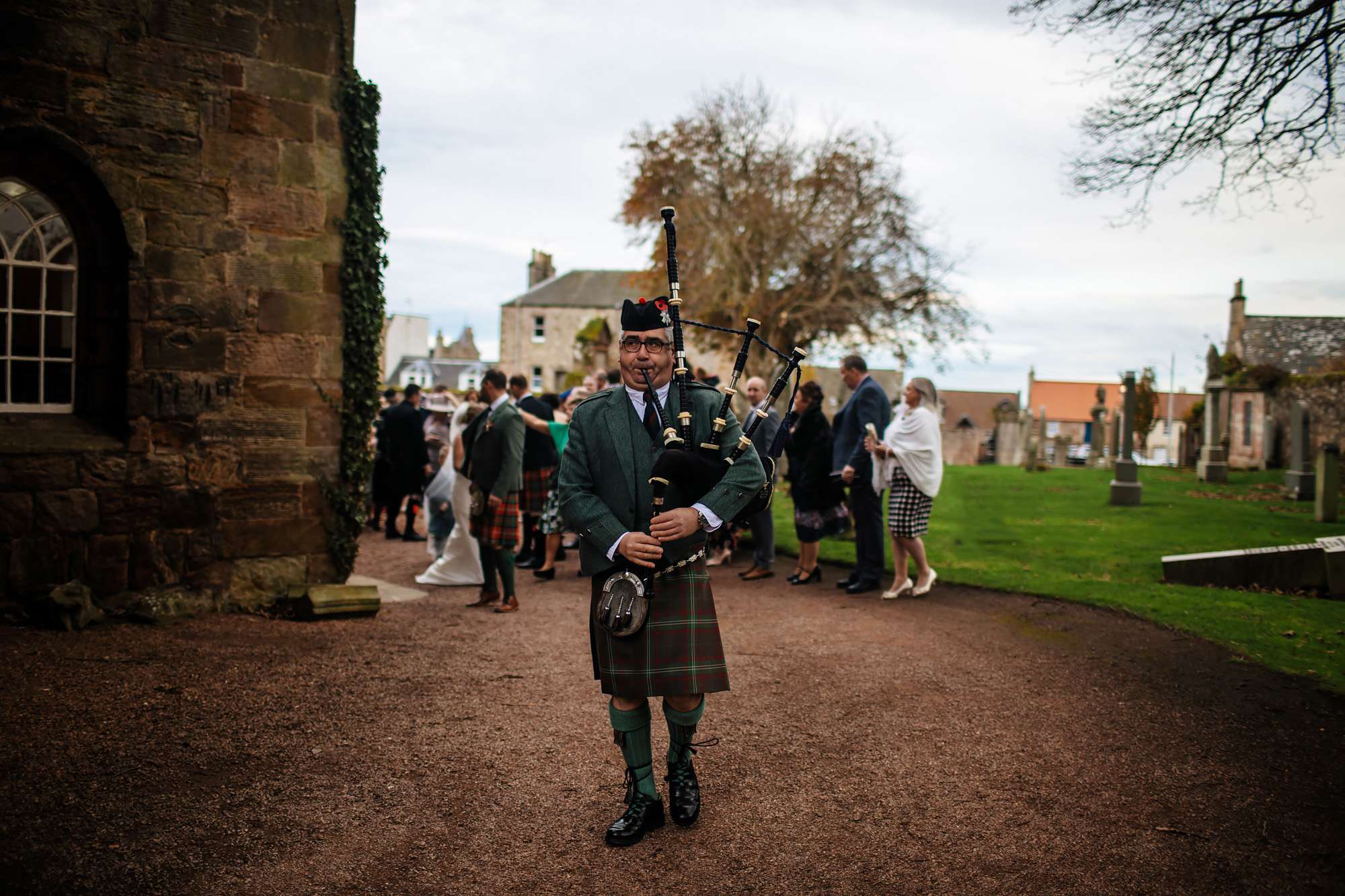 Piper at a church wedding in Scotland