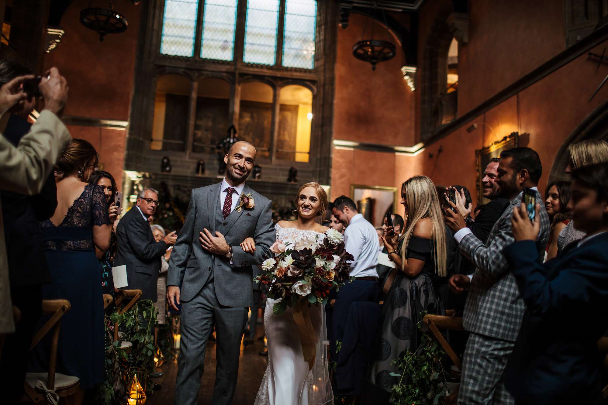 Bride and groom walking down the aisle at a wedding