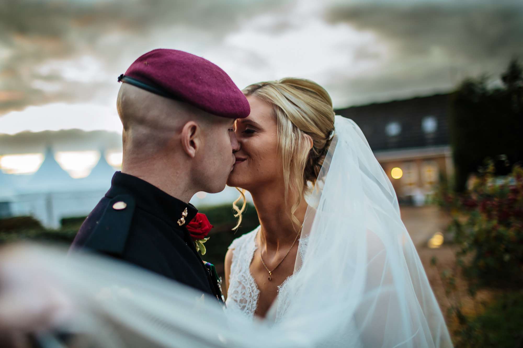 Bride and groom kissing at a wedding