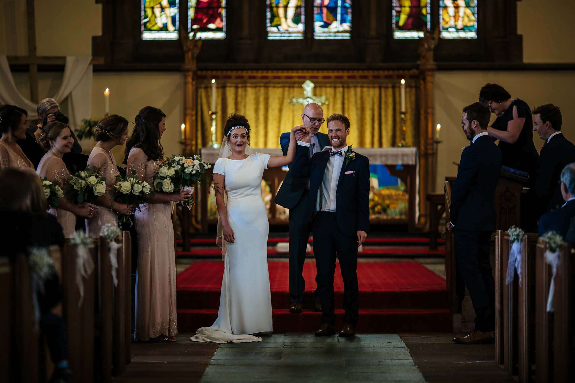 Bride and groom celebrate their church wedding