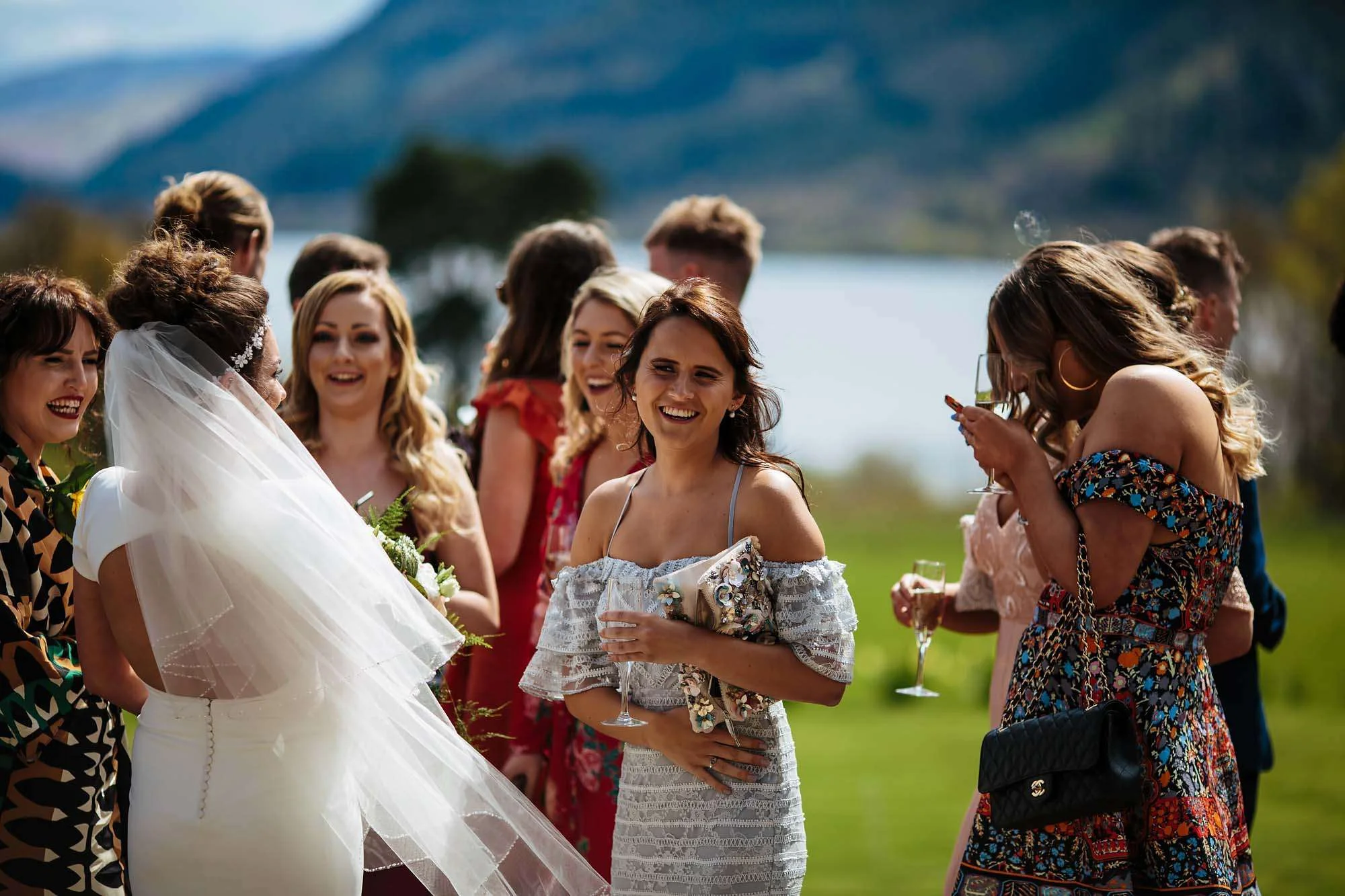 Wedding guests socialising at Armathwaite Hall