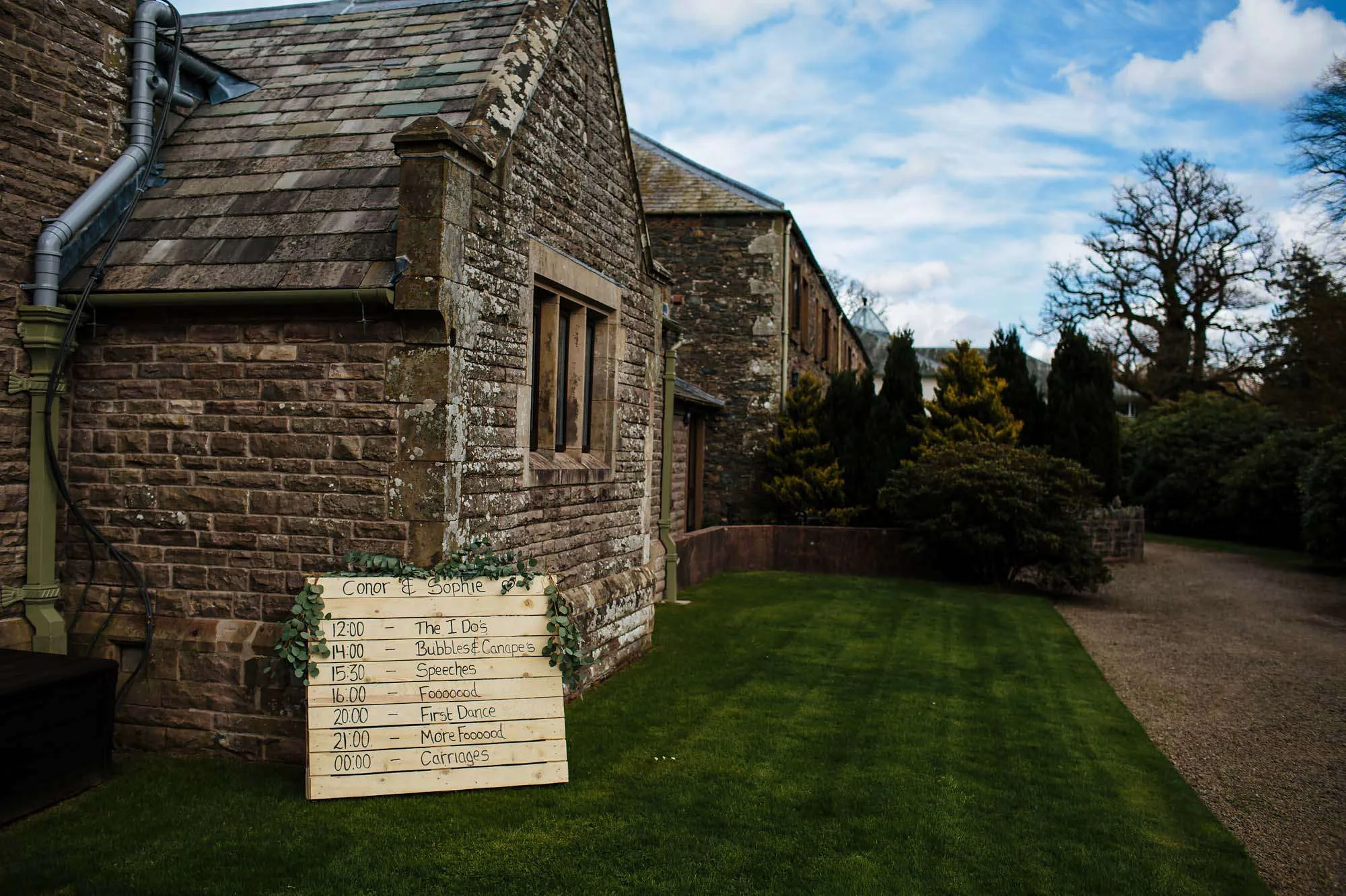 Wedding itinerary sign at Armathwaite Hall