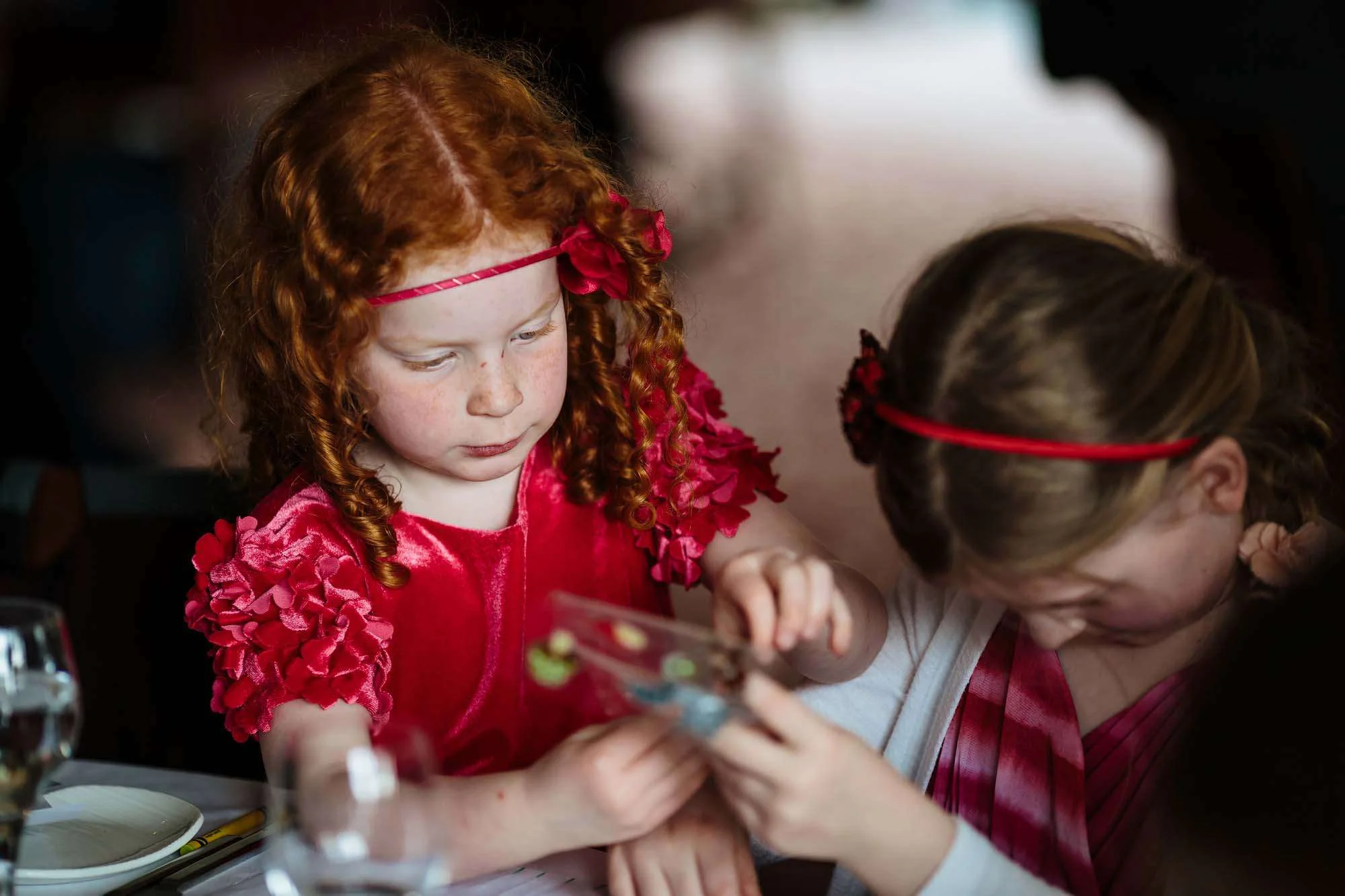 Young ginger girl at a wedding