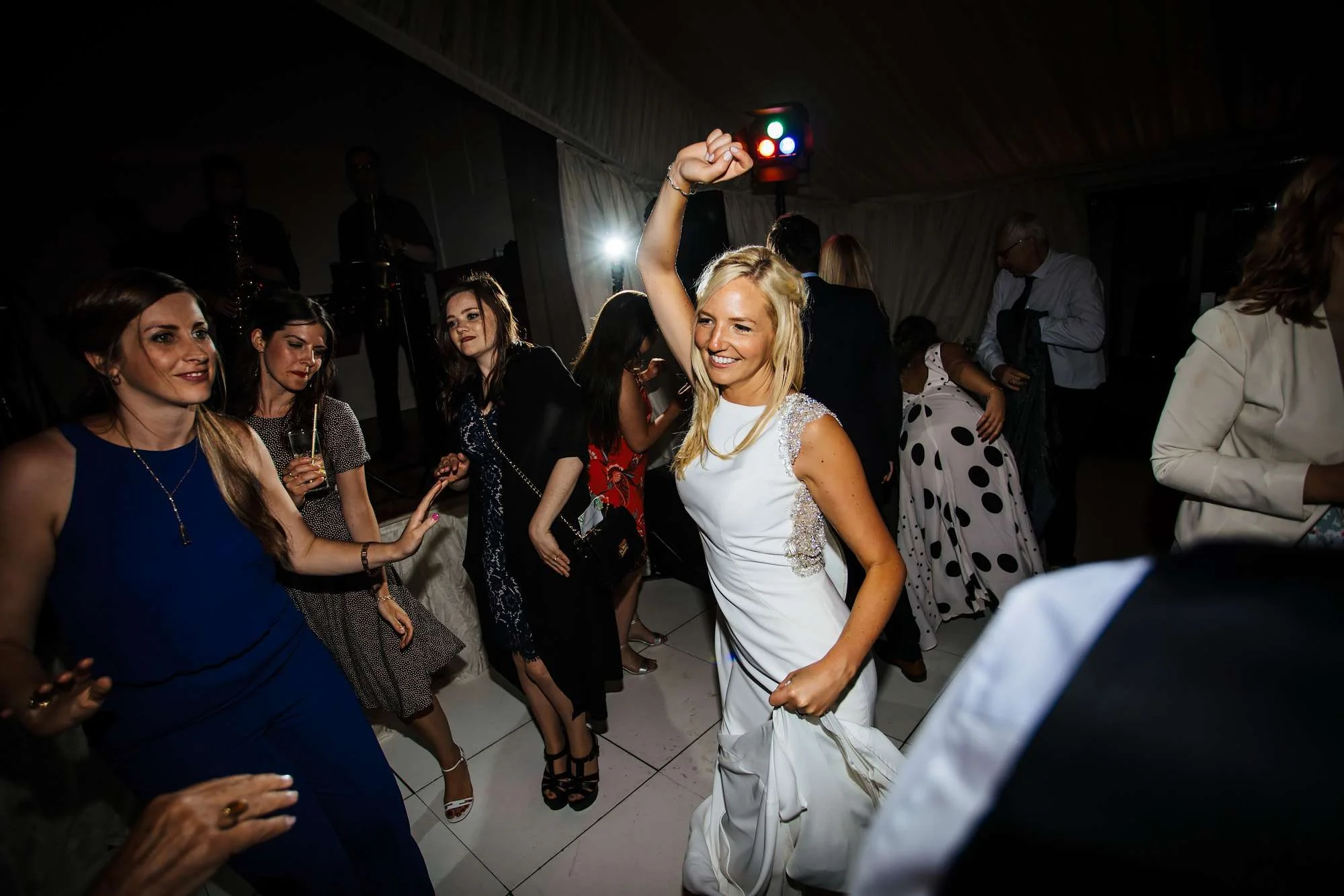 Bride dancing with guests at her Leeds wedding